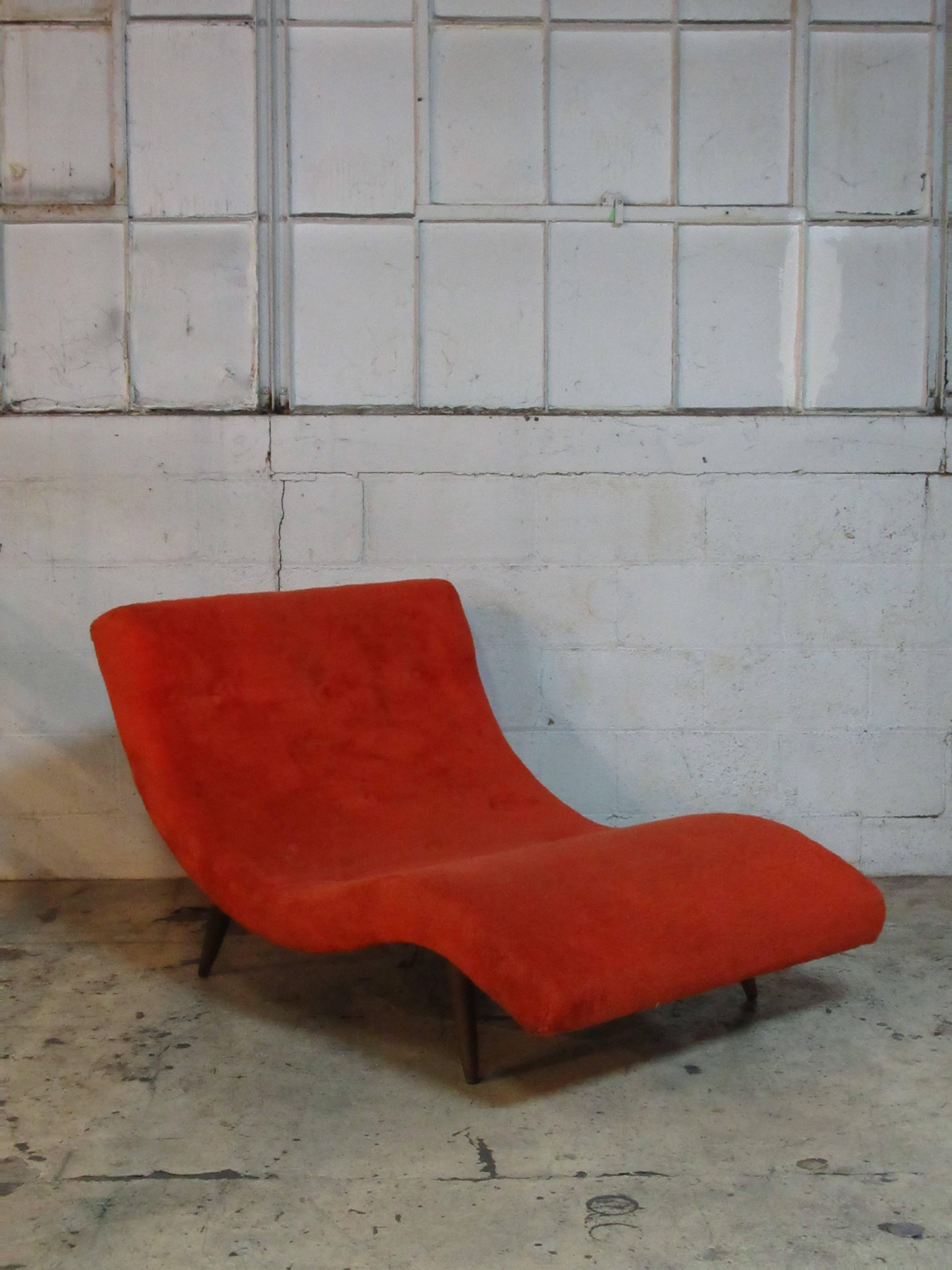 Adrian Pearsall attributed wave chaise lounge in deep blood orange faux fur upholstery. All original vintage condition. Structurally solid. Circa 1960s. See pictures.