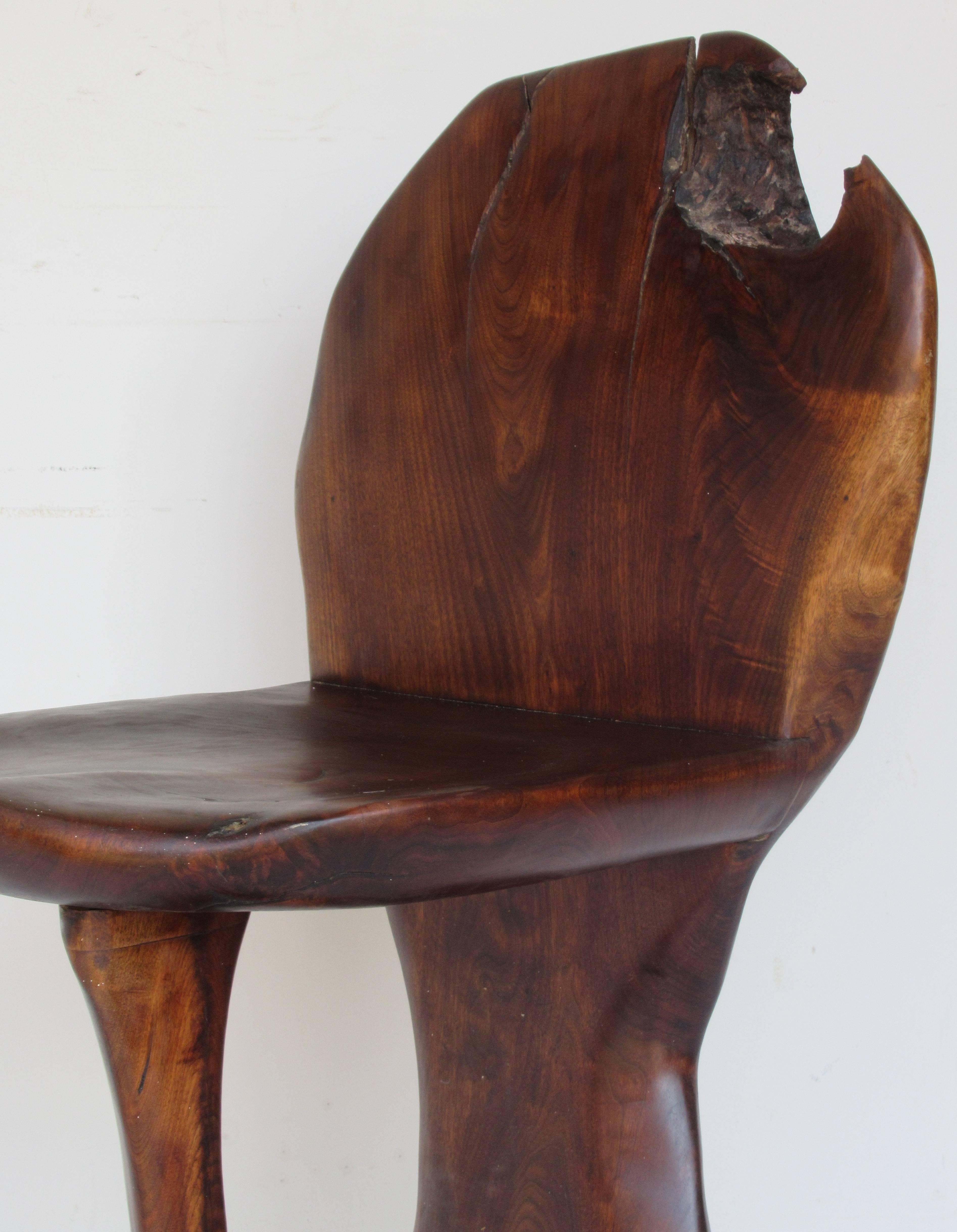 1970s American studio furniture Craft movement organic modern sculpture chair / stool in beautifully aged surface with a rich deep color patina to strongly figured black walnut. From Western NY state. Great looking chair. See all pictures.