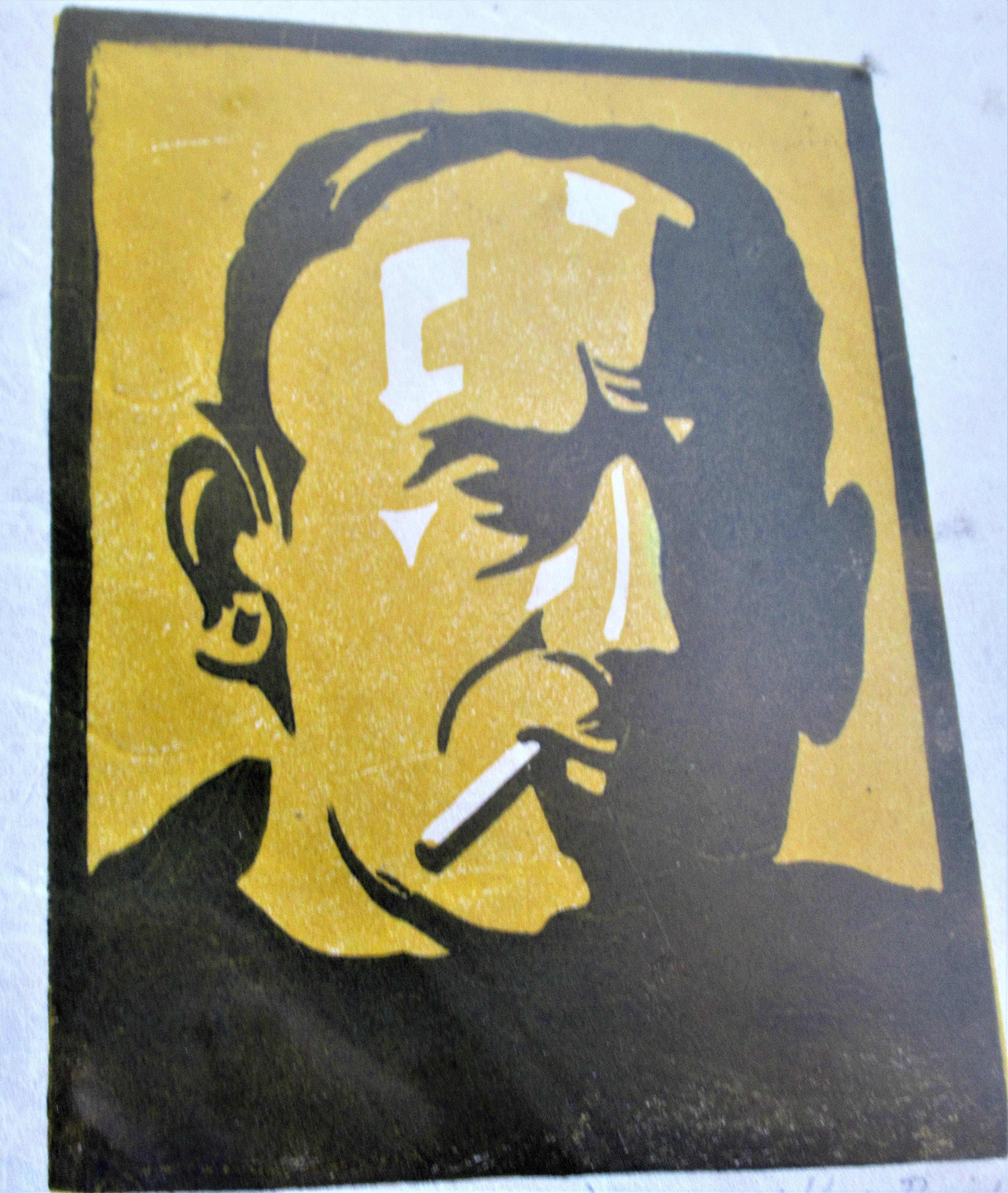 A wood cut print on laid paper of a hard edged looking man smoking a cigarette. Compelling period imagery. Pencil signed and dated  below image - Reichle - 1932 - titled  " Walt "