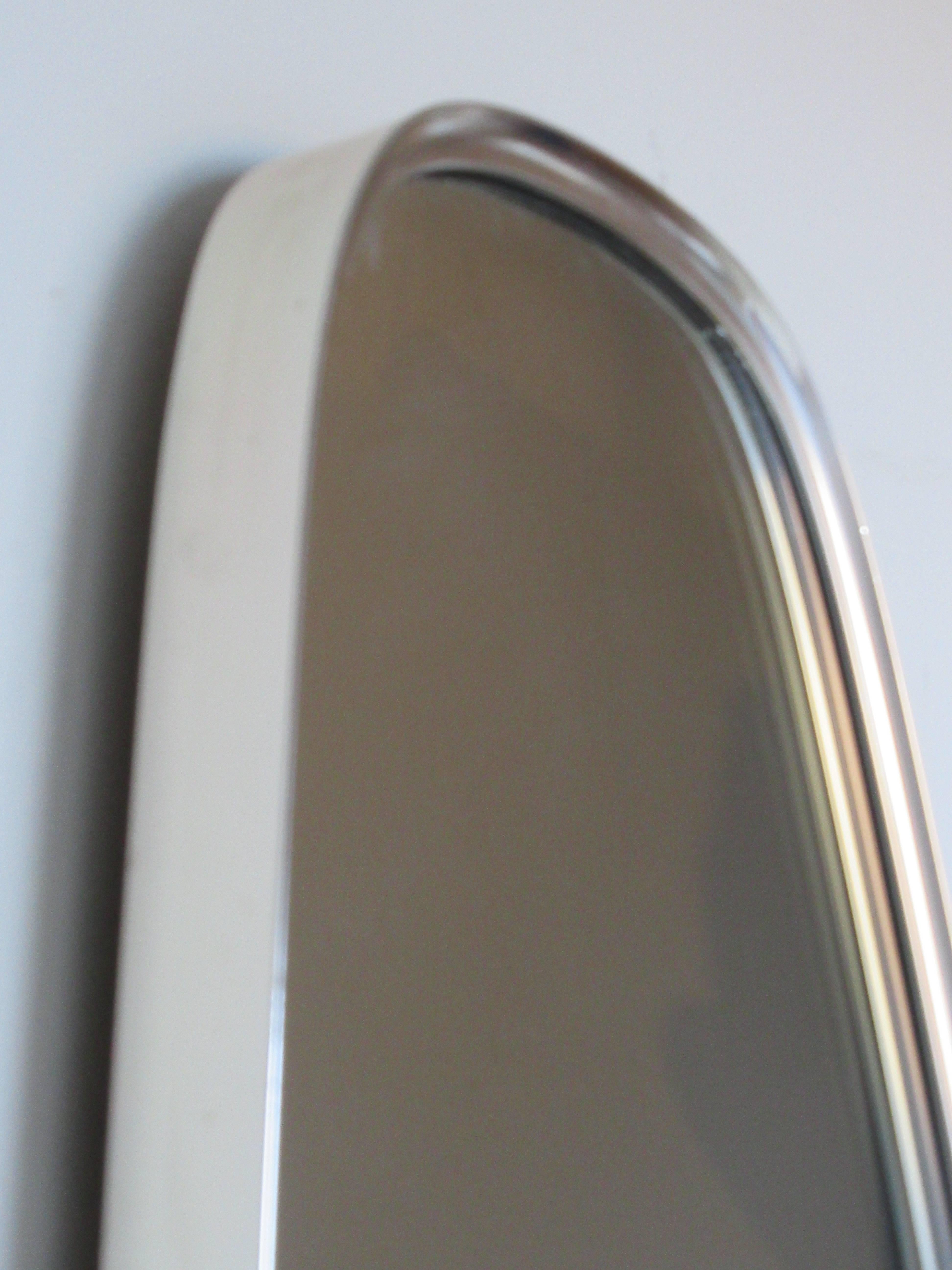 Pyramidal oblong brass framed wall mirror in the Italian modernist style of Gio Ponti, circa 1960s. Very good quality - overall great vintage condition. See all pictures.