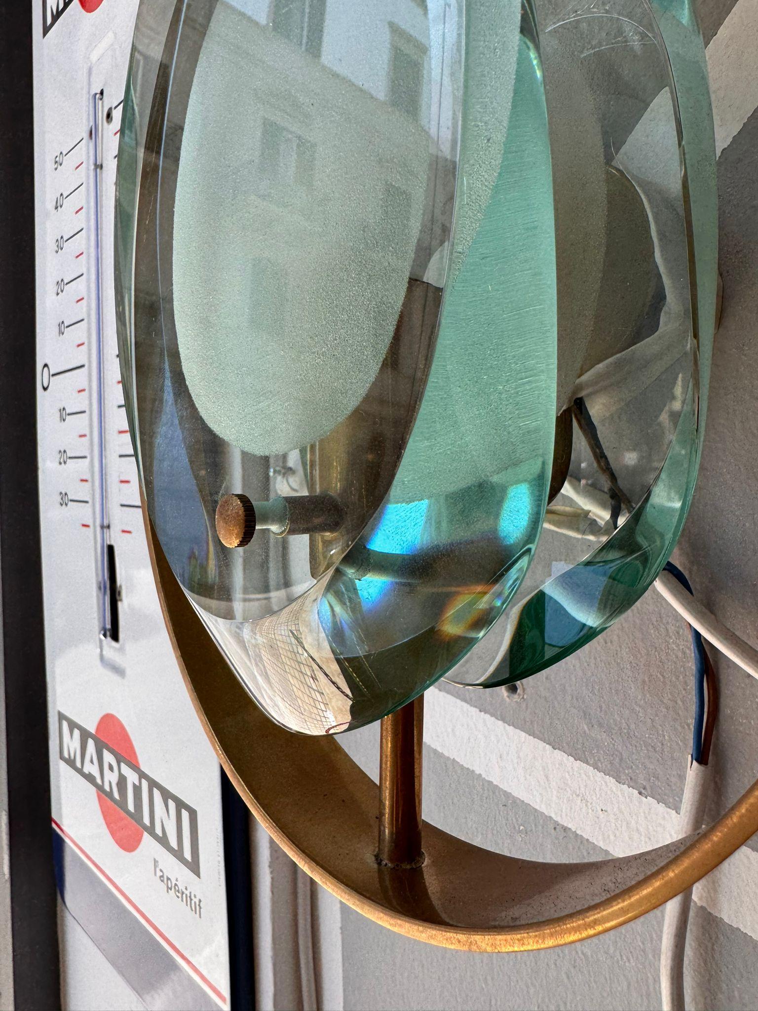 Coppia di applique Max Ingrand per Fontana Arte Italia, anni ’60
Raffinate, scultoree, senza tempo. Queste applique disegnate da Max Ingrand per Fontana Arte negli anni ’60 sono un perfetto esempio di come il design possa elevarsi a pura