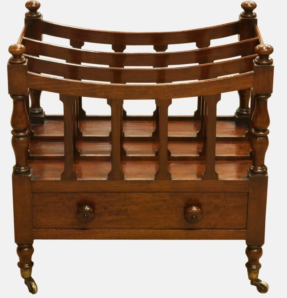 A good Regency 'Boat' shape mahogany canterbury.

With single drawer and in original condition including casters.

circa 1820.