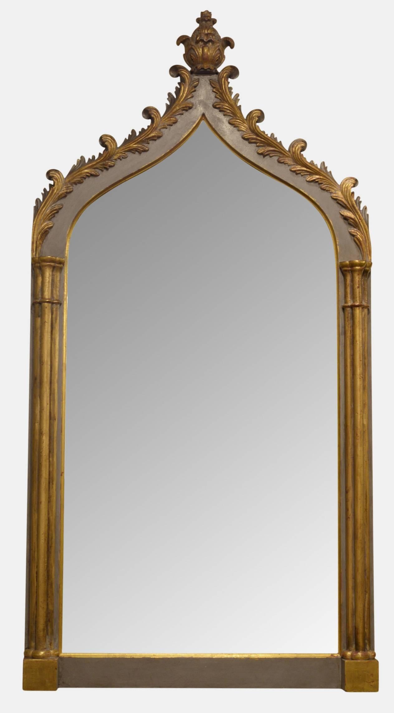 Pair of carved wood and parcel-gilt Gothic Revival mirrors,

20th century.

Measures: 121cm (47.6