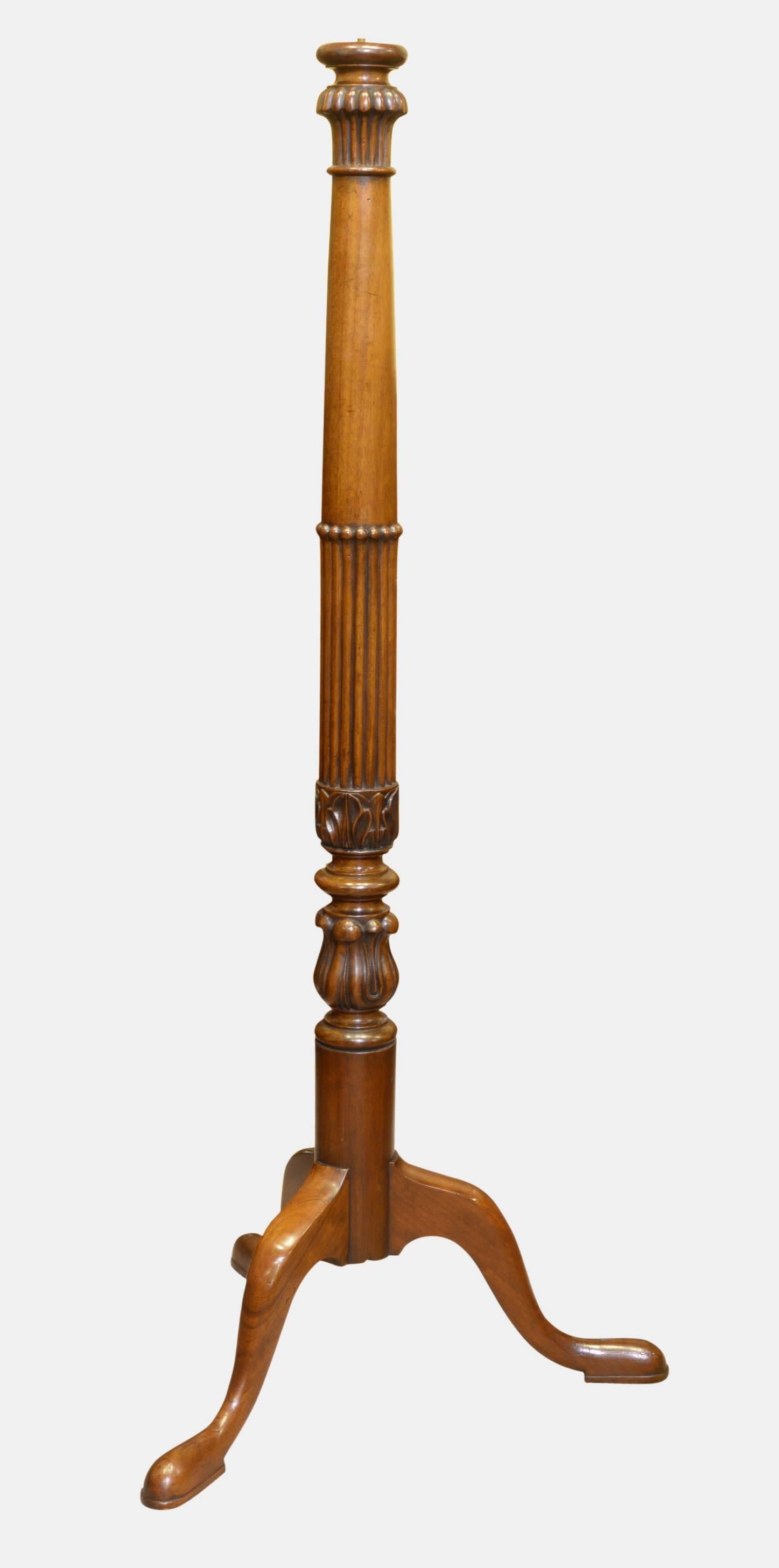 A pair of 19th century mahogany torcheres with boldly colored shafts. Now drilled for electricity,

circa 1870.
Measures:
146 cm (57.5