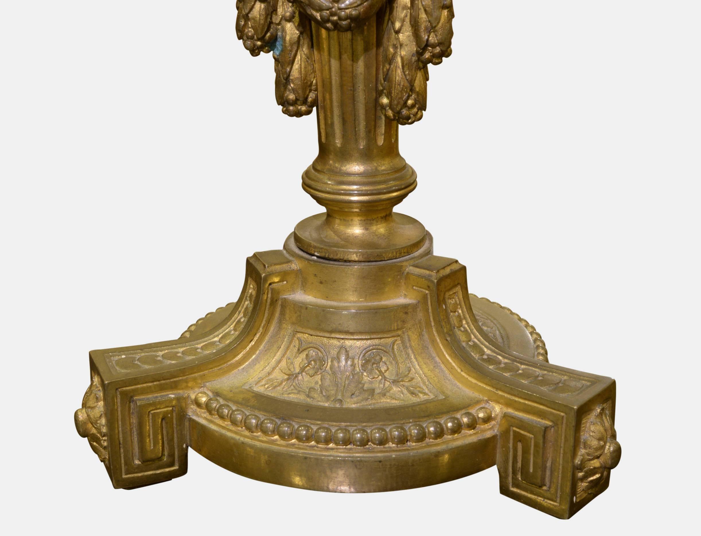 Late 19th Century Pair of French Louis XVI Gilt Bronze Candlesticks For Sale