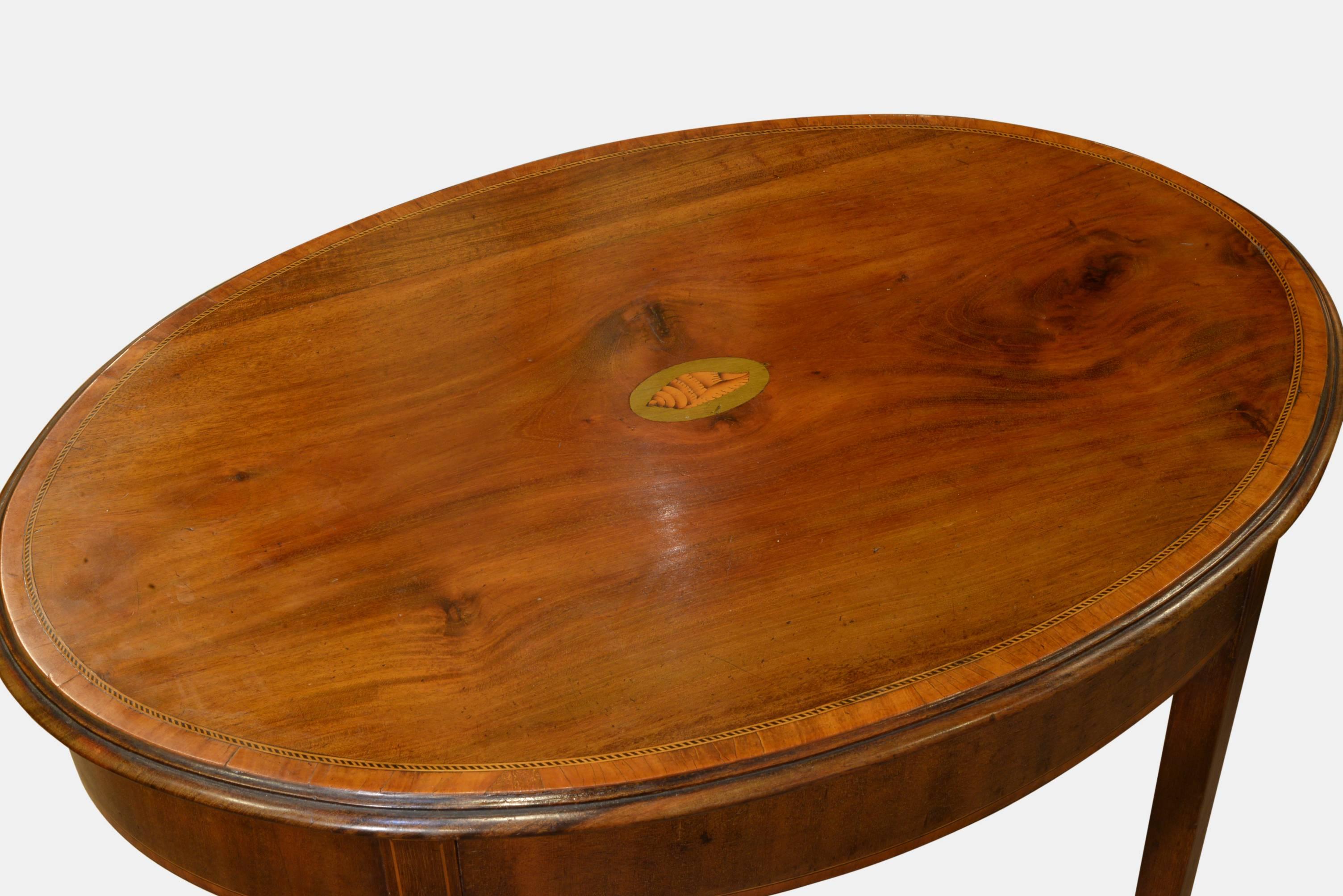 An Edwardian inlaid oval mahogany occasional table,

circa 1910.

Measures: 71cm (28.0