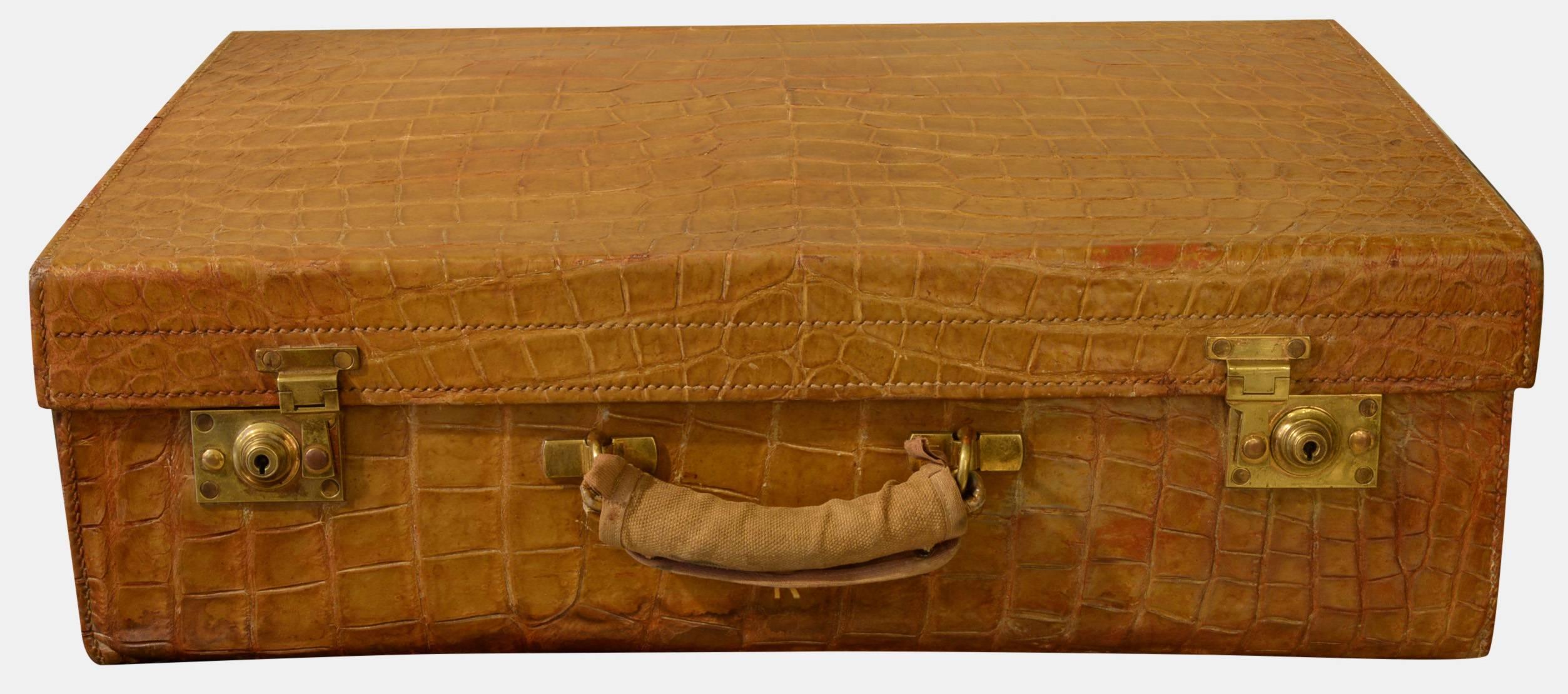 Drew & Co. crocodile suitcase,

circa 1910.