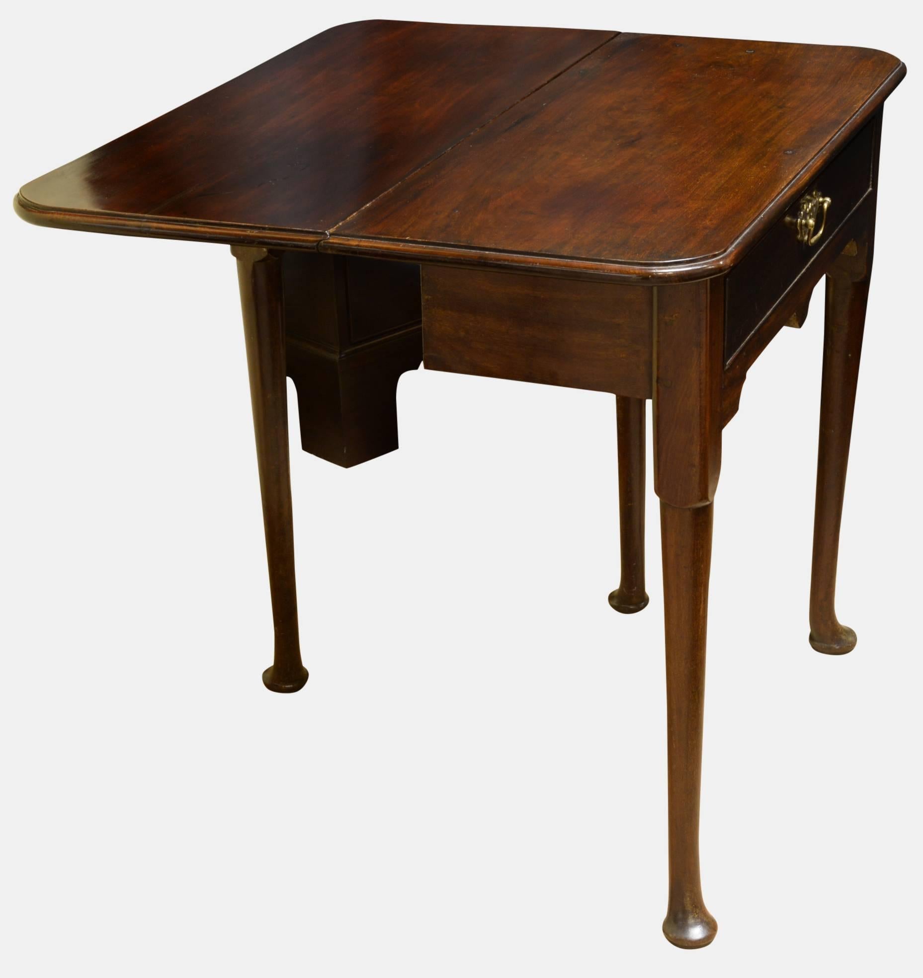 Oak lined red walnut single drawer and single flap gate leg table. With original handle,

circa 1725.