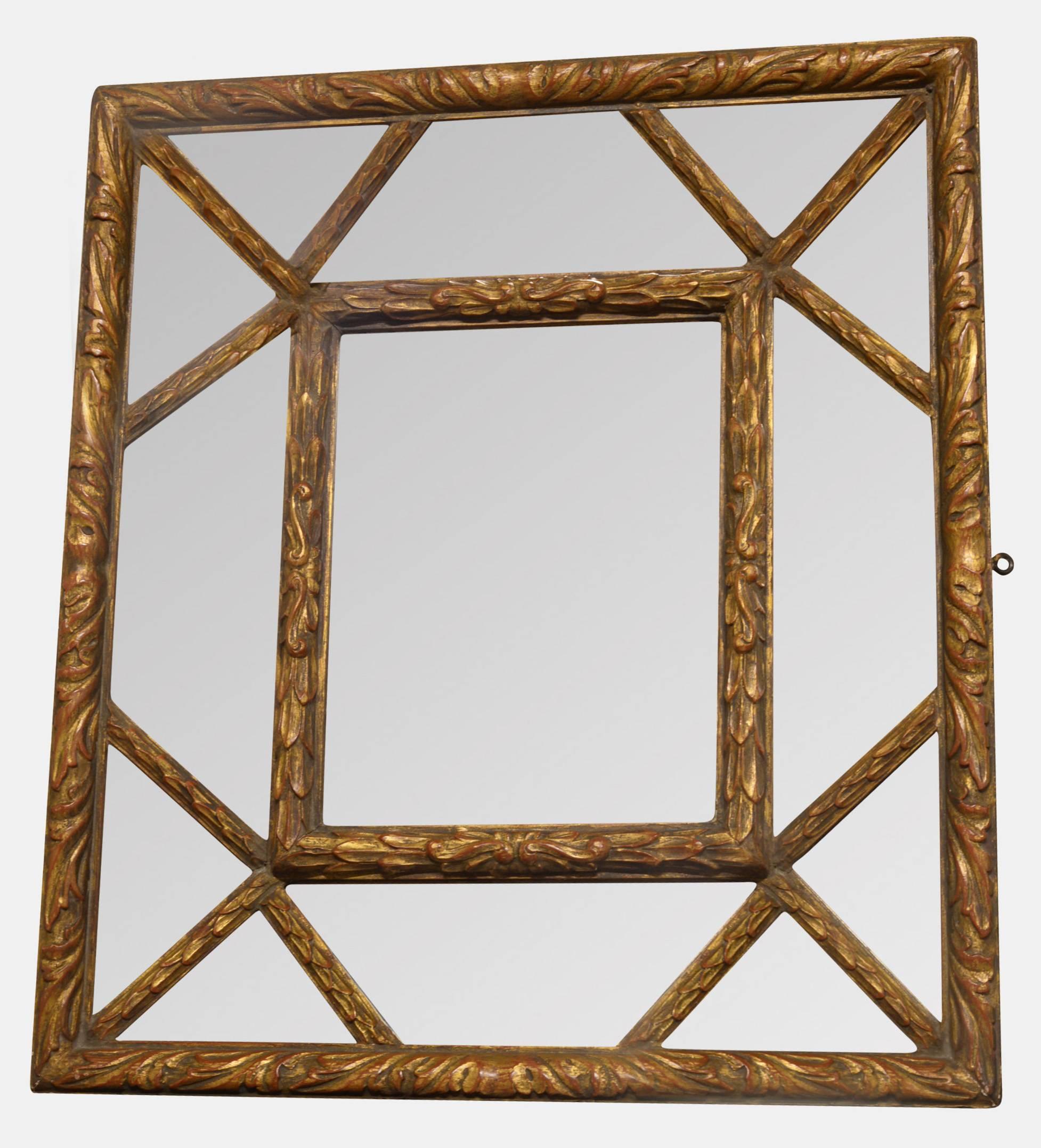 A French carved wooden framed mirror set in carved gilded wooden box frame,

circa 1900.