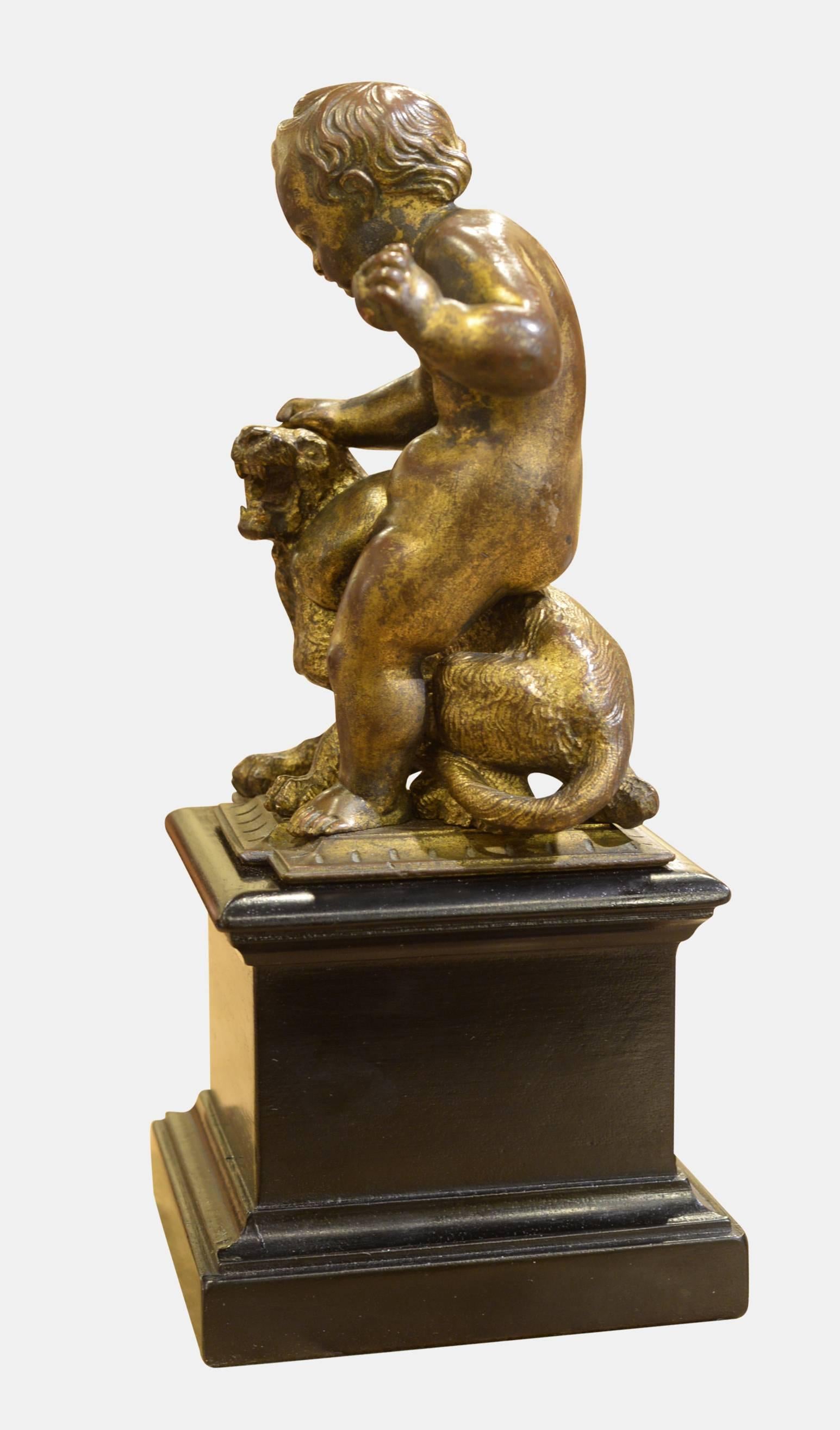 Early 19th century French gilt bronze of the infant Bacchus with his attendant panther. Lovely rubbed gilt patination, raised on an ebonised plinth,

circa 1820.