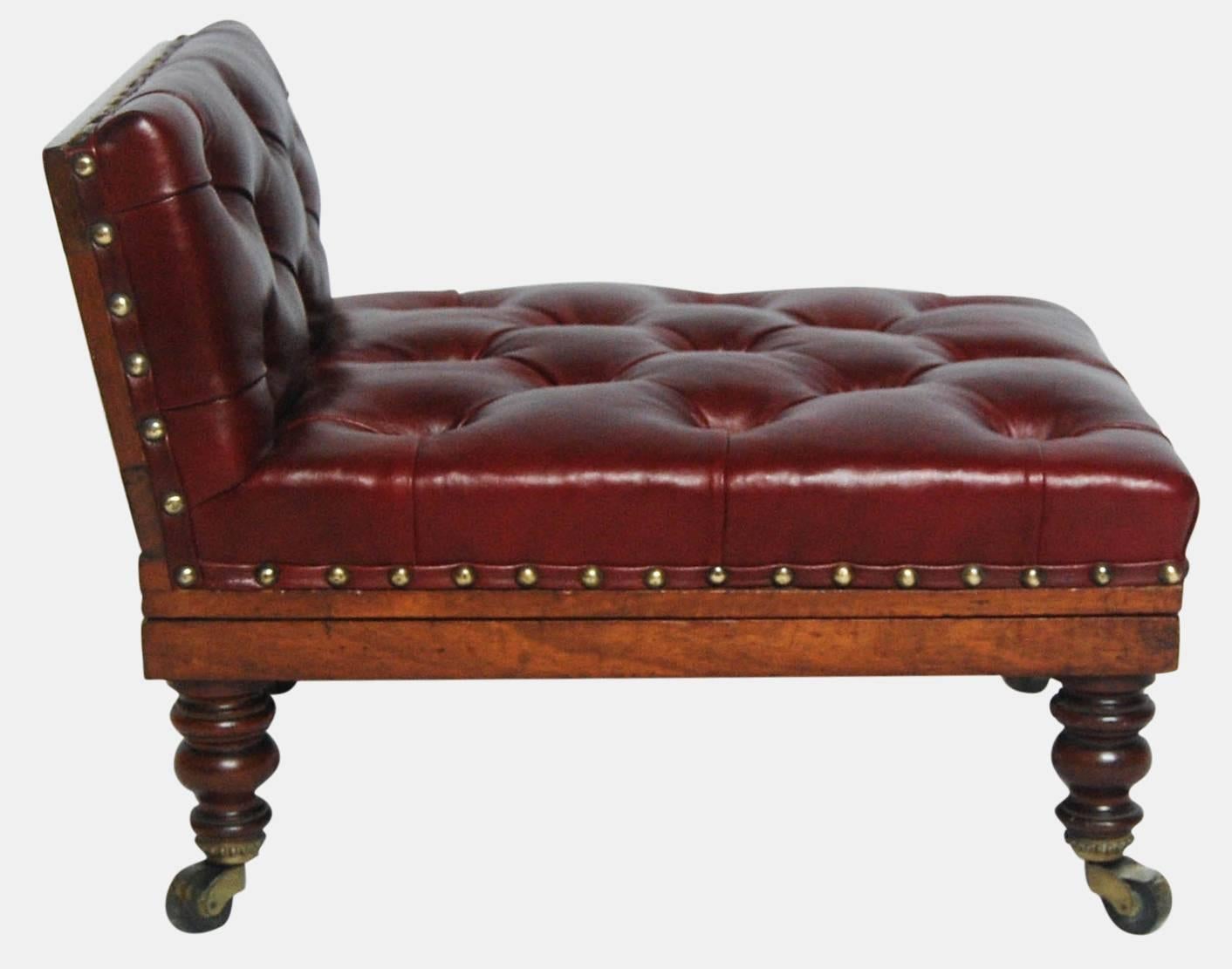 A late Victorian mahogany and buttoned leather gout stool on single ratchet mechanism.