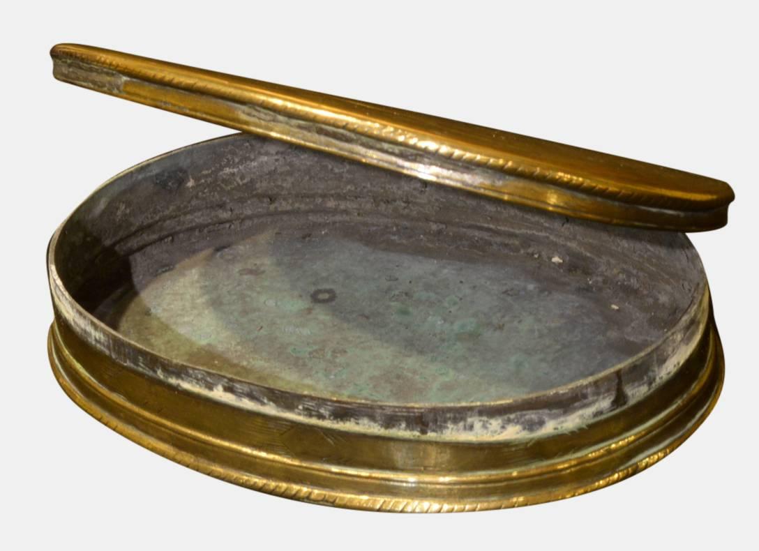 An 18th century oval Dutch brass tobacco box.

circa 1780.