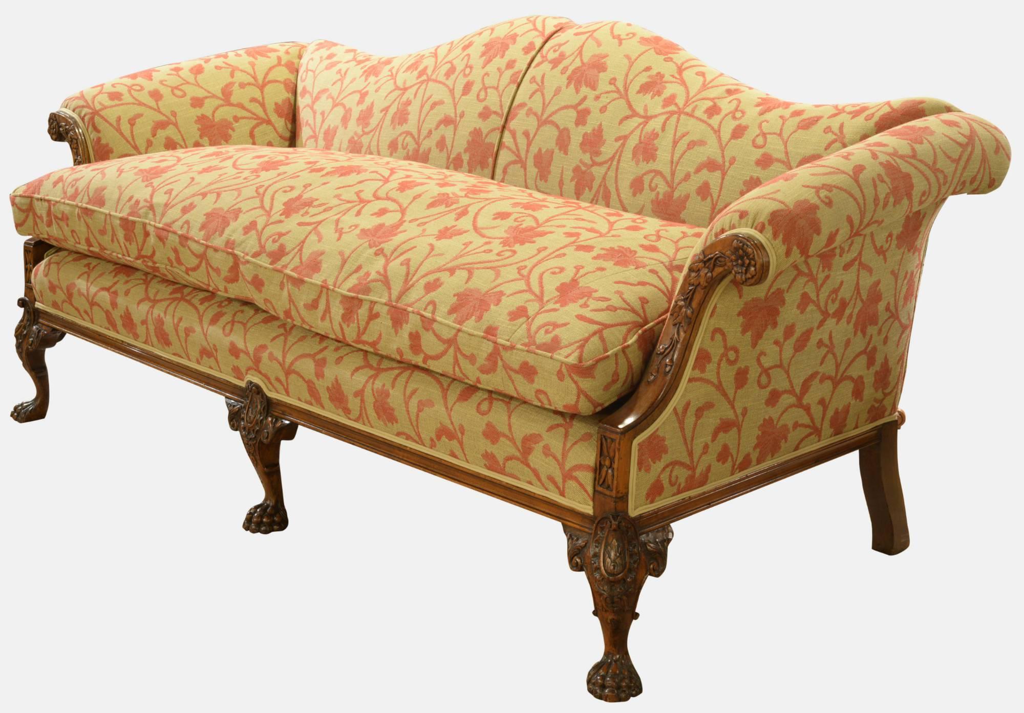 A George III style camel back sofa on cabriole legs. Re upholstered.

circa 1920.