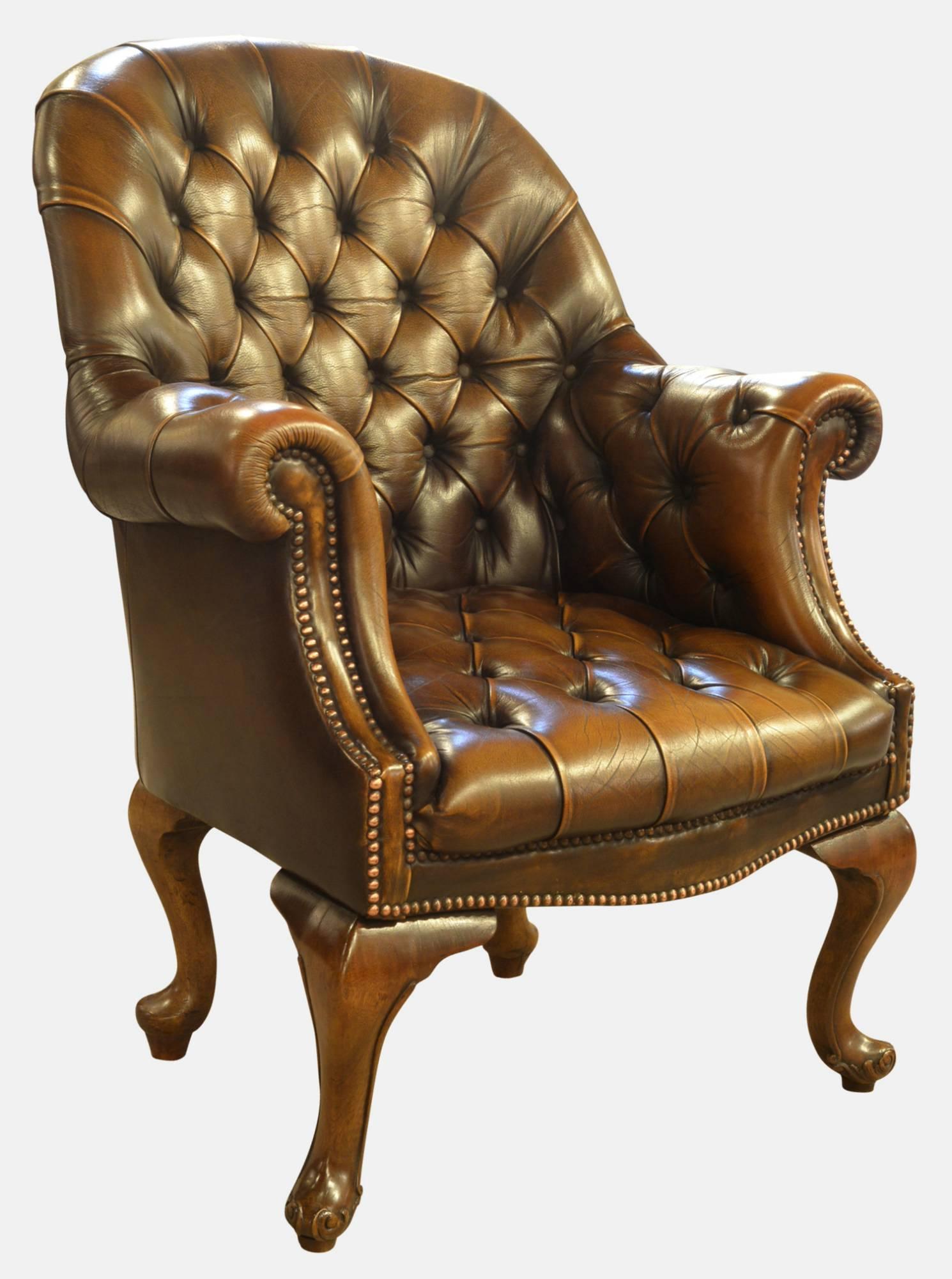 Queen Anne style walnut and leather library chair,

circa 1950s.