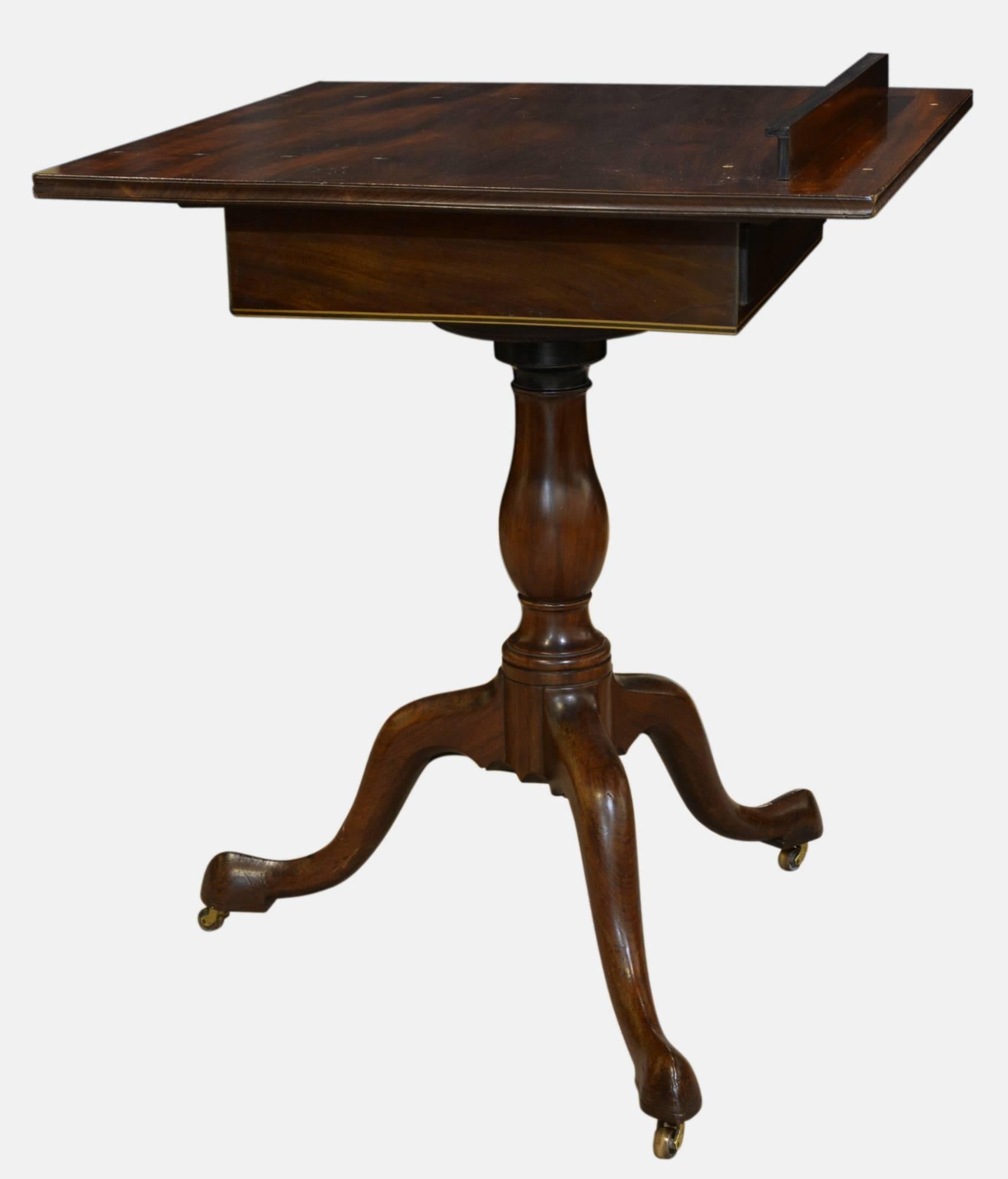 18th century mahogany artists or reading table with boxwood stringing and drawer,

circa 1760.