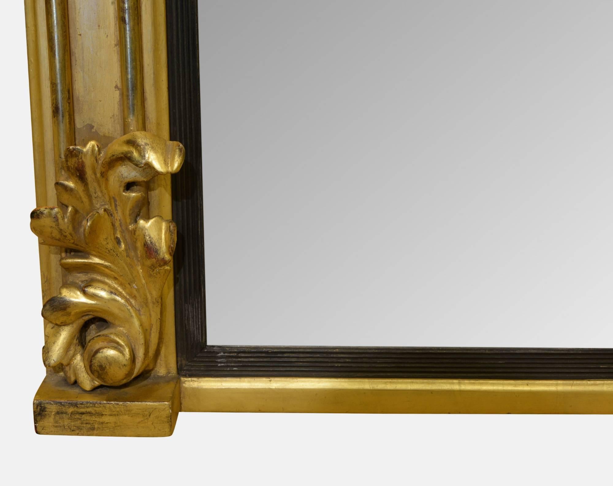 A William IV carved wood and gilt overmantel mirror,

circa 1830.
 