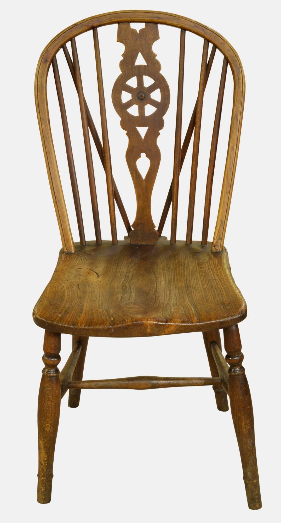 An antique elm and ash wheelback single chair,

circa 1820.