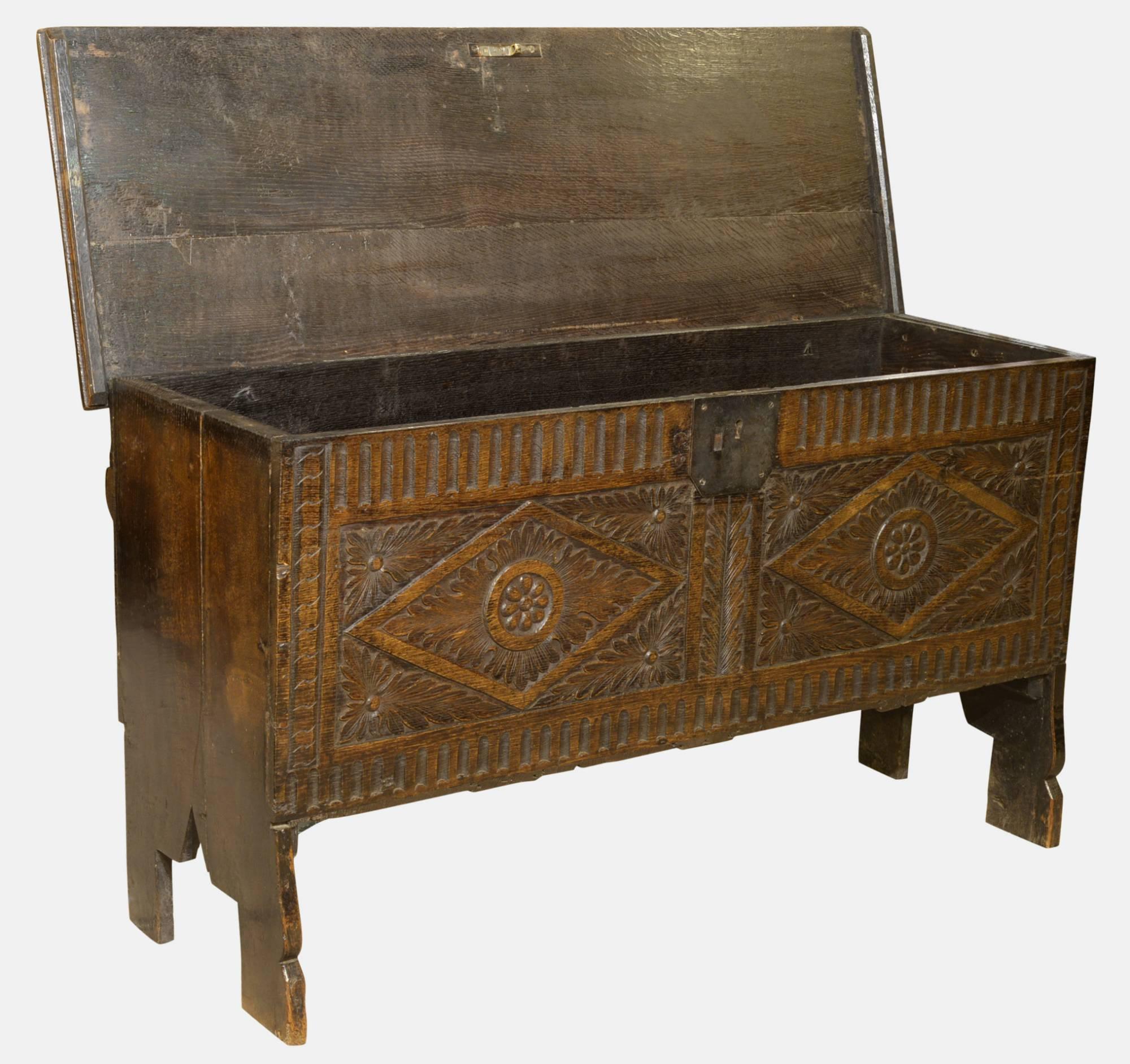 17th century oak carved front six plank coffer,

circa 1770.
 