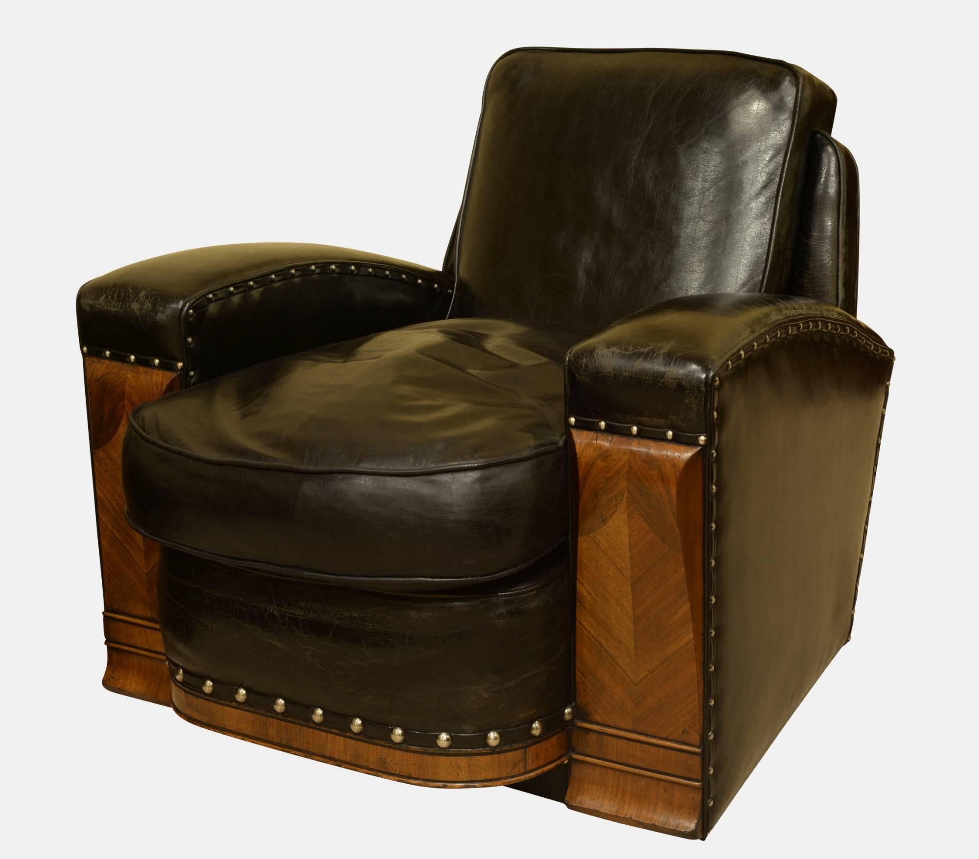 A very fine Art Deco, walnut, black leather settee and chairs.