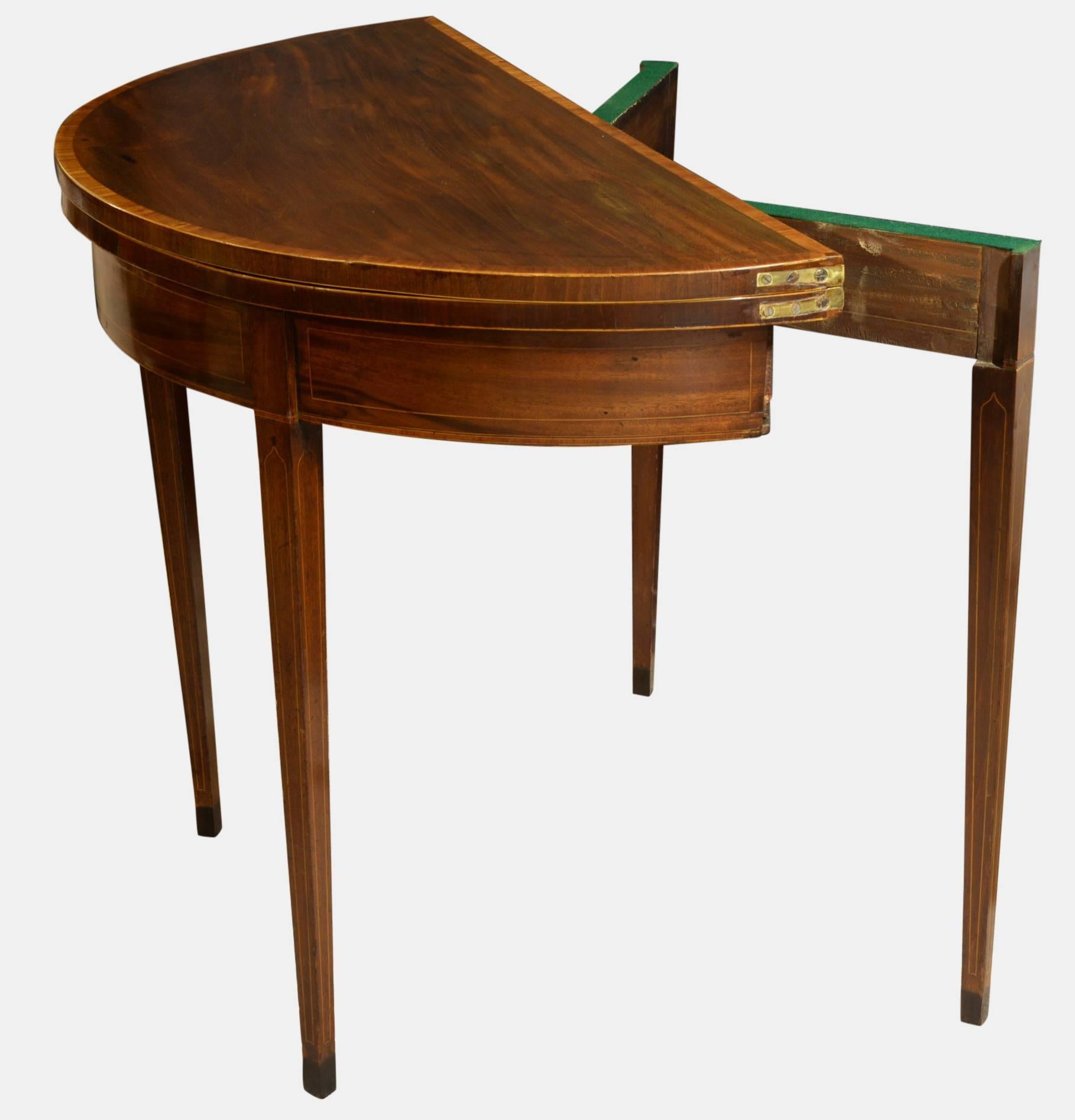 Georgian mahogany demilune card table with satinwood banding. 

D 45cm closed.