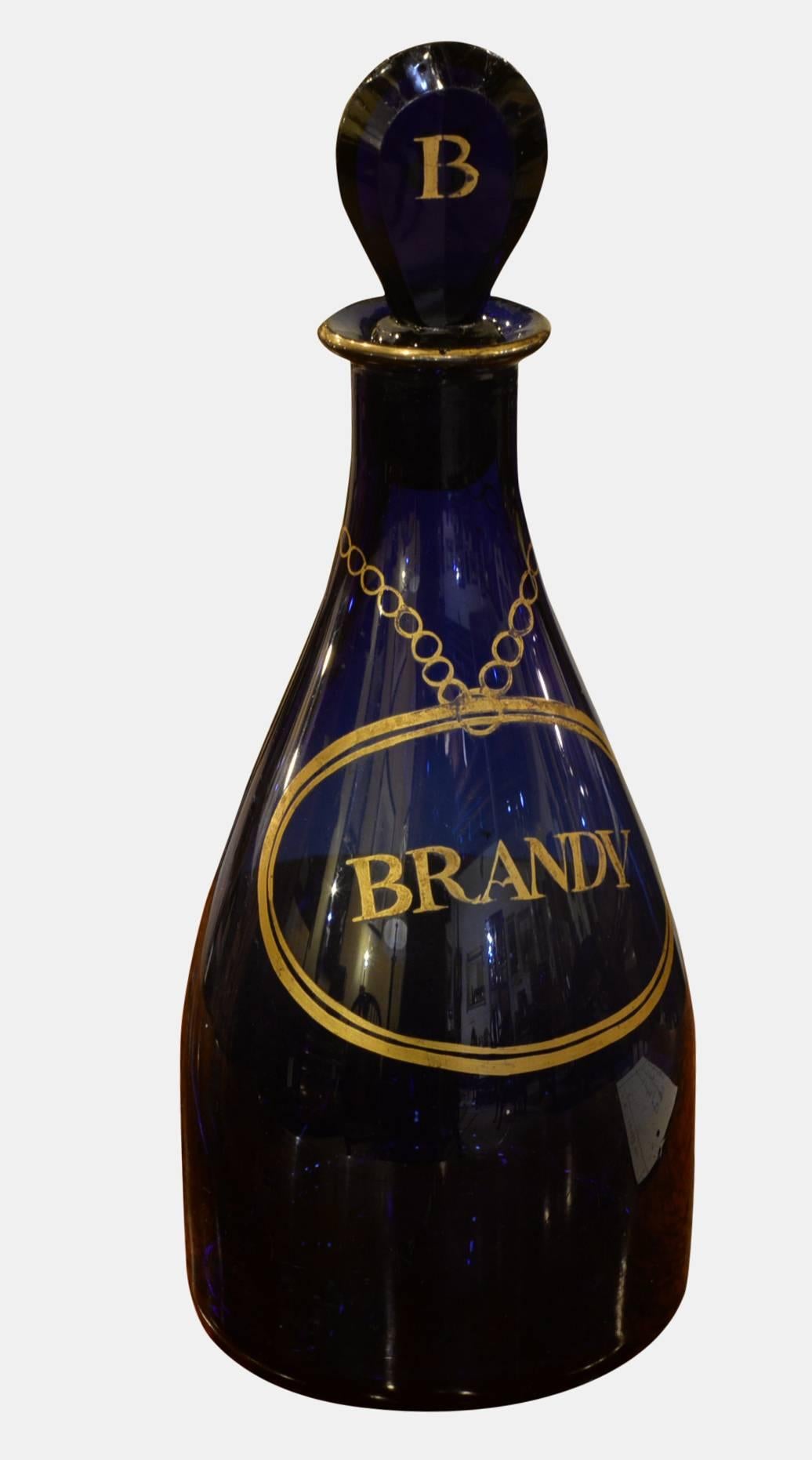 A Georgian Bristol blue glass club shaped brandy decanter.