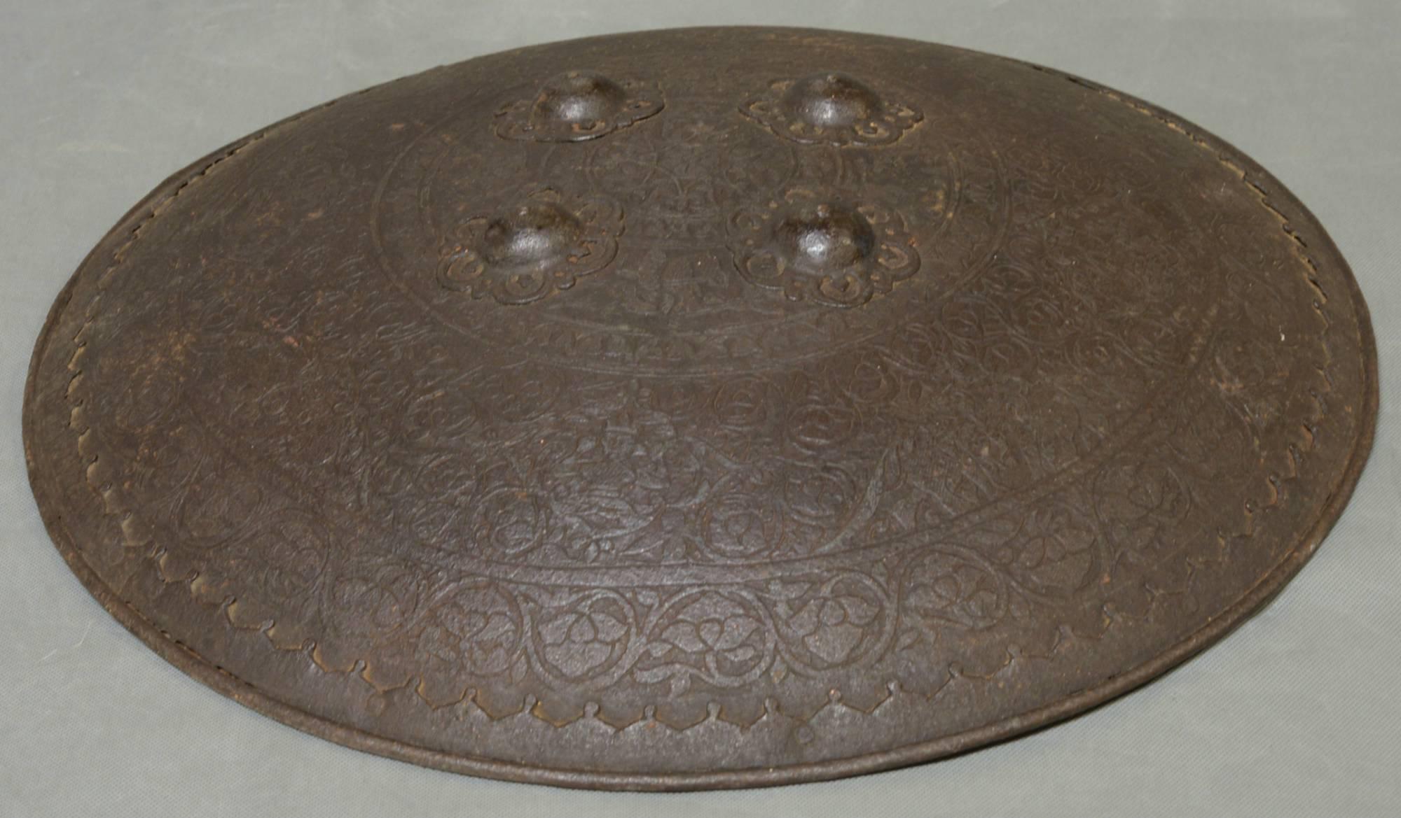 A late 18th century or early 19th century embossed Indo-Persian dahl shield.