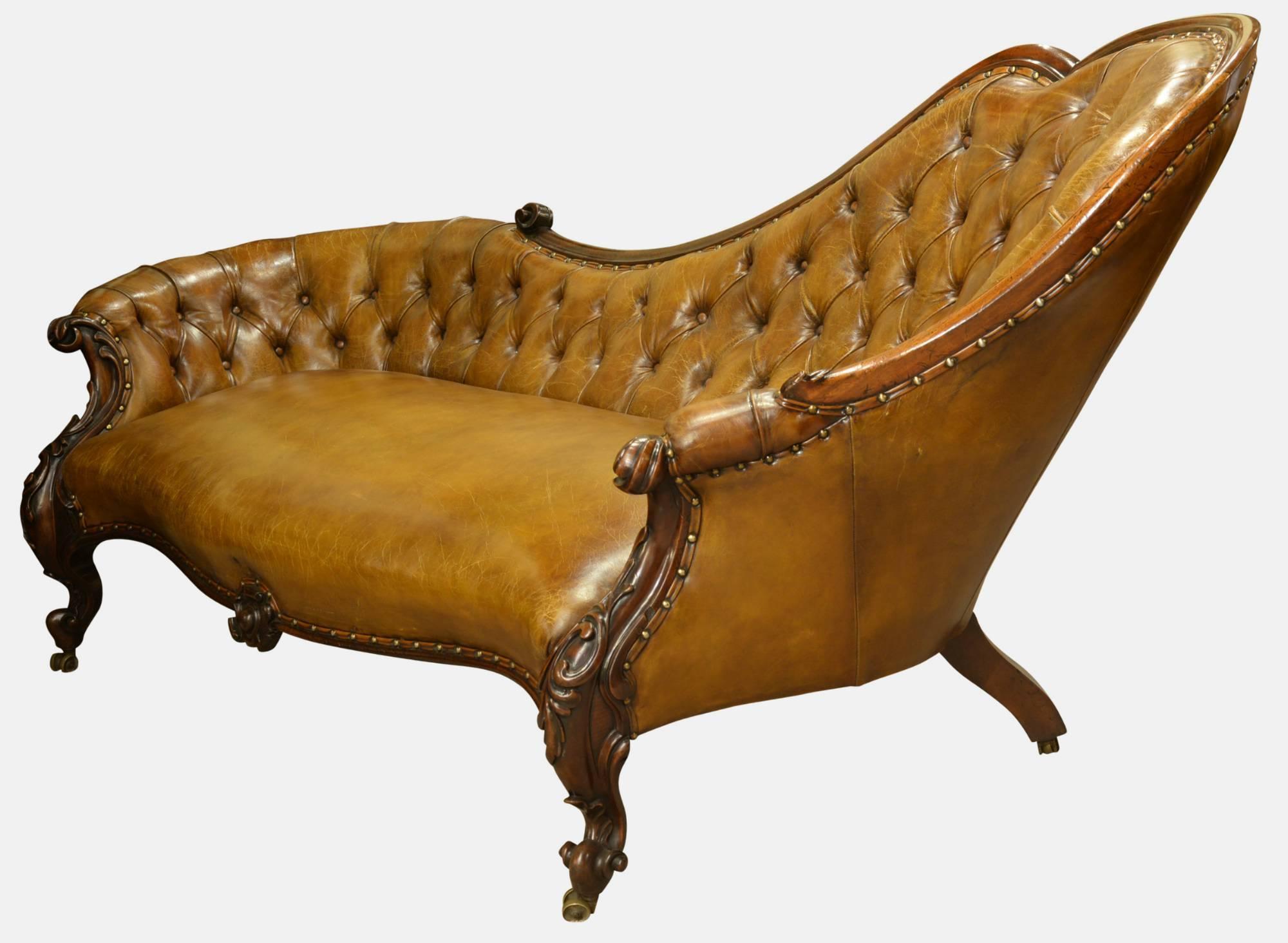 A fine quality deep buttoned chestnut leather Victorian chaise longue, 

circa 1850.