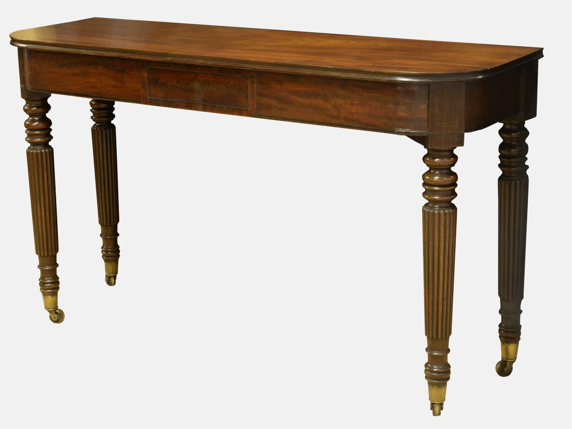 A pair of Regency mahogany console tables of good color and in original condition in the style of Gillows.

circa 1810.
     