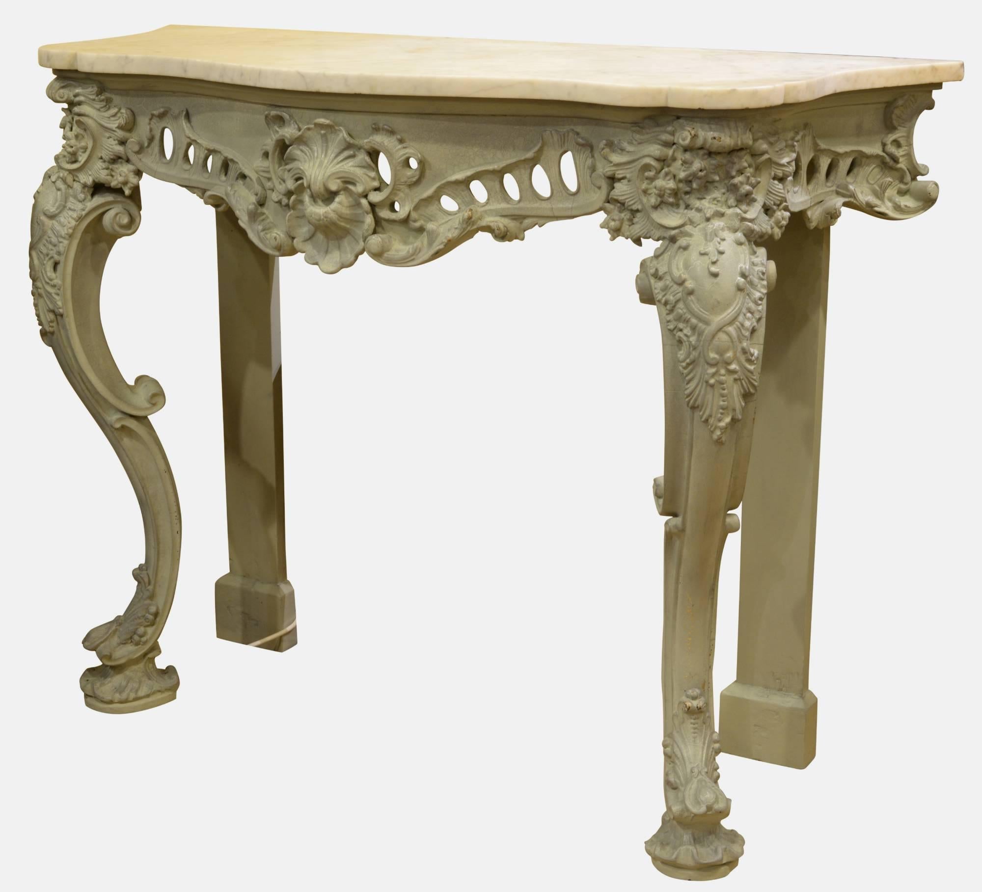 Mid-19th century carved and gesso Rococo console table. With original marble. Style of 1750.

circa 1850.