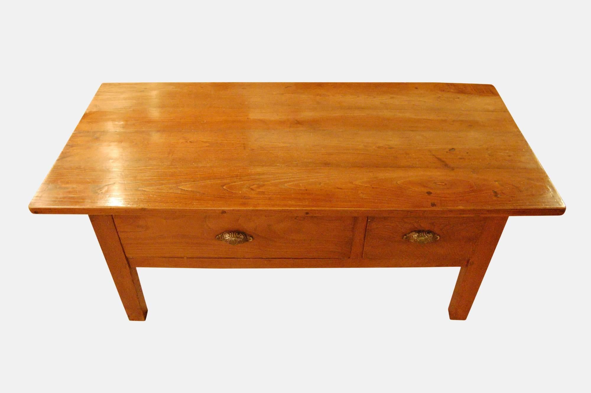 A lovely two-drawer coffee table 

circa 1890.