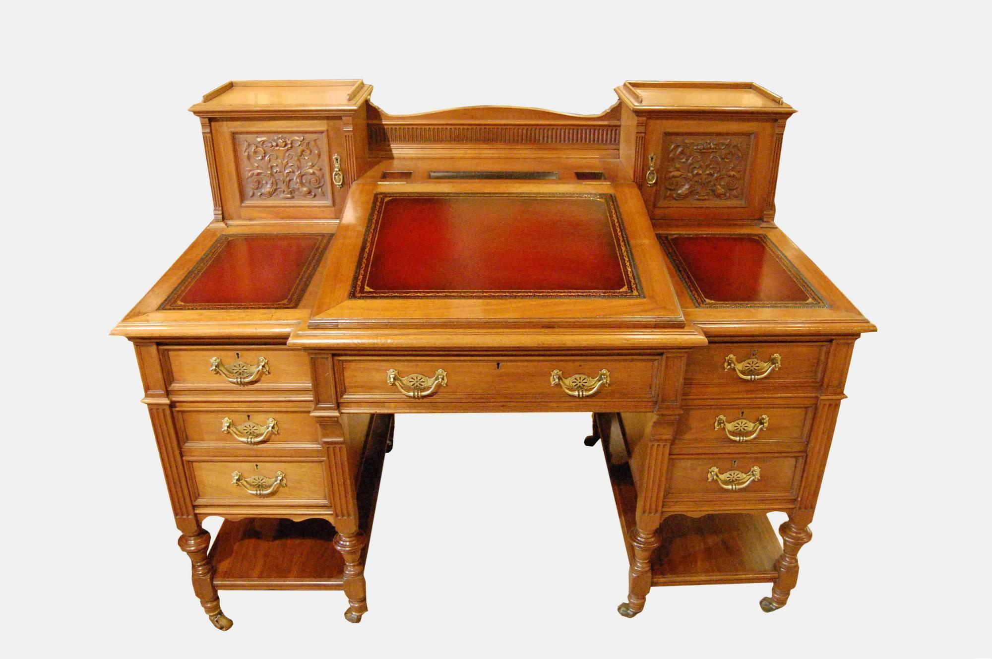 Branded with Maple & Co. This is a beautiful walnut register desk with several draws and cabinets, circa 1880.