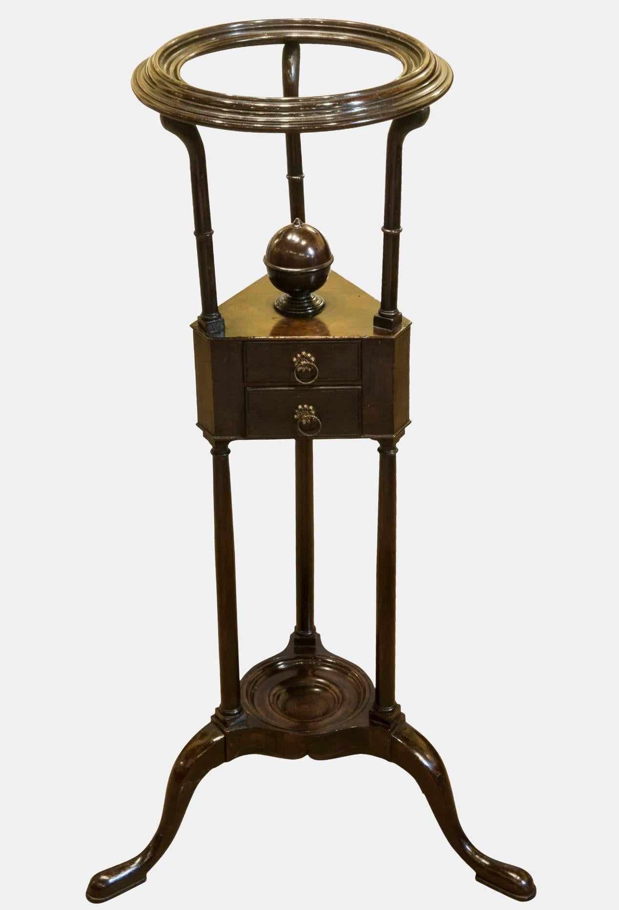 A mahogany wig powdering stand in its original condition.