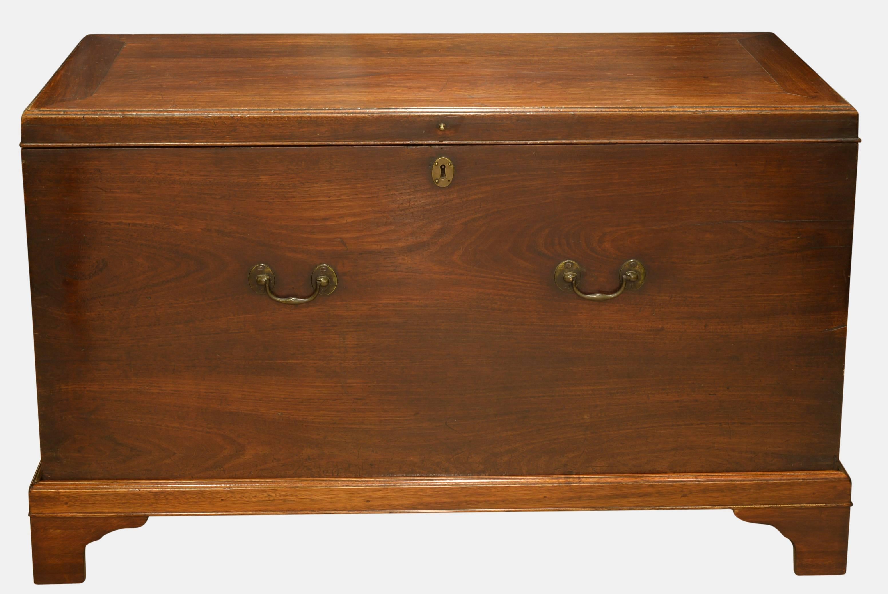 A Chippendale period mahogany storage chest with original bronze handles on a later bracket foot stand, circa 1760.

74cm (29.1