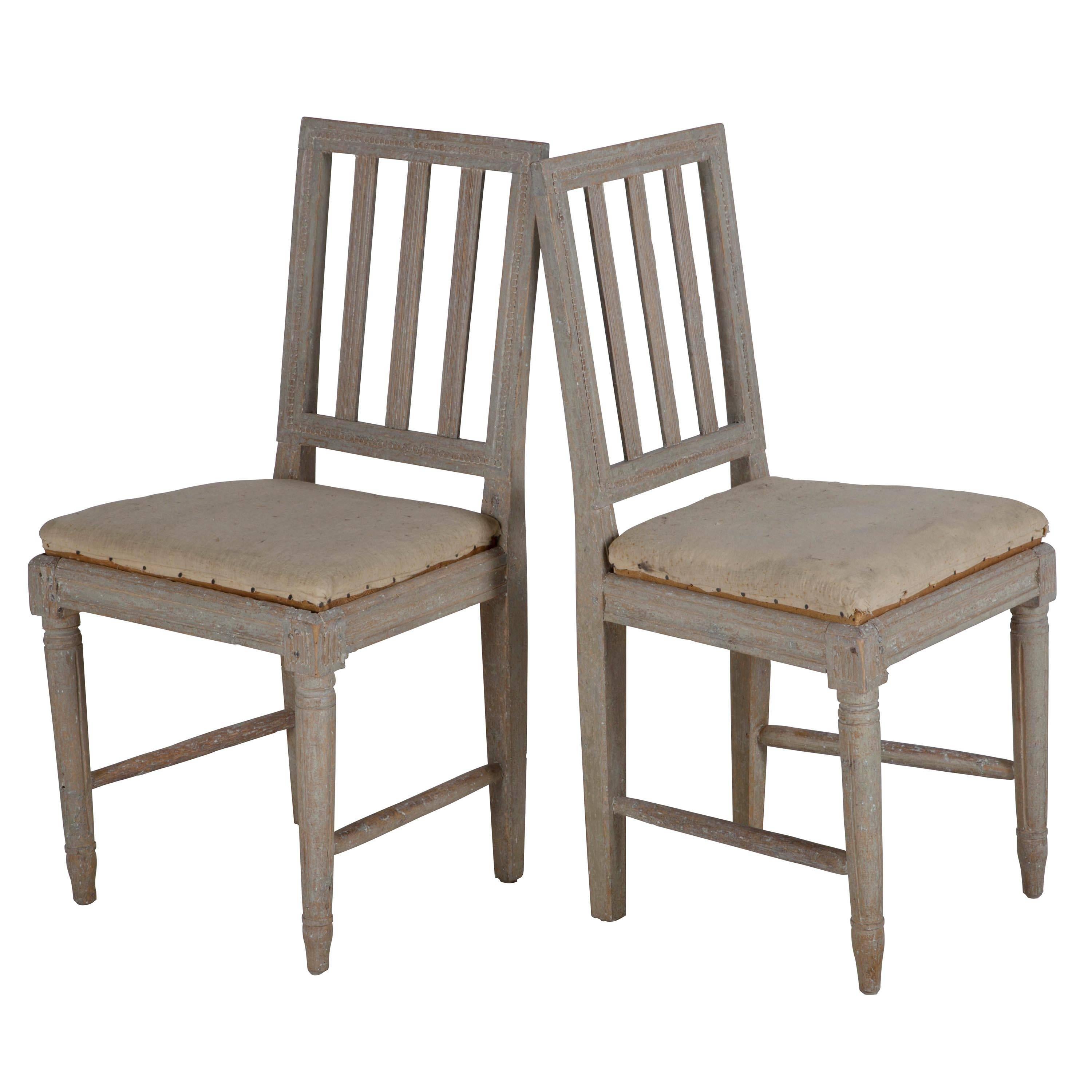 Set of four Gustavian Provincial dining chairs in original paint.