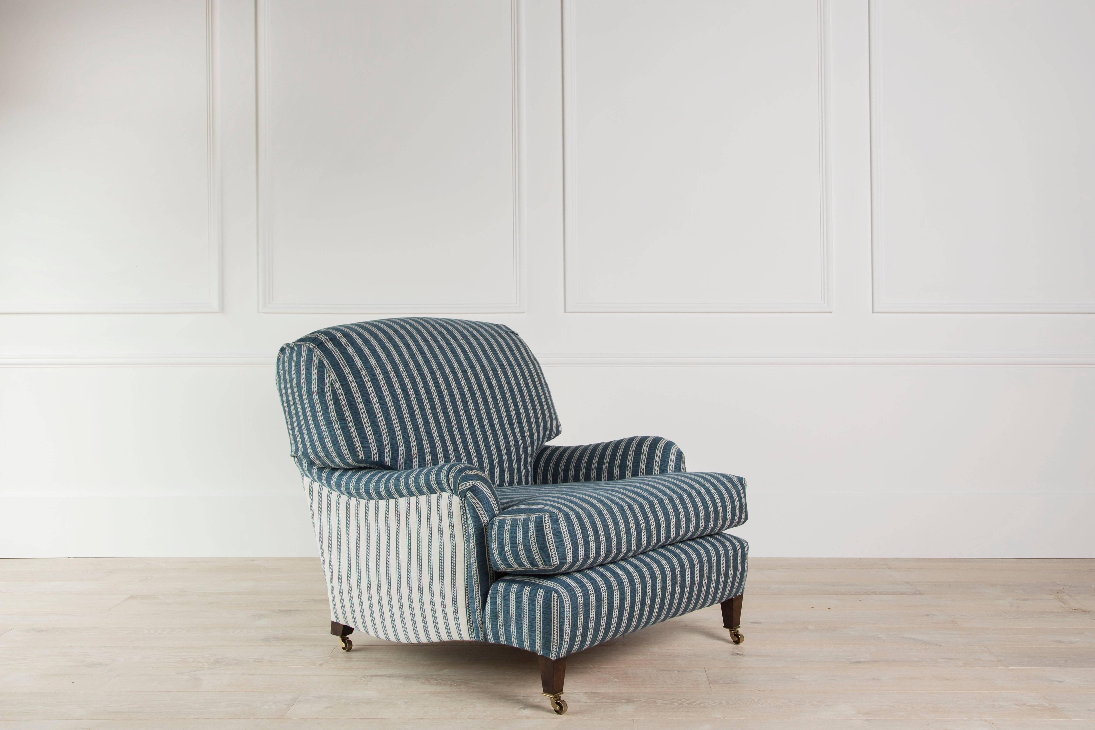 A supremely comfortable armchair, hand-built in our Gloucestershire workshop to the exact specification of the Howard & Sons ‘Ivor’ model.

The Kingston Armchair is made from a hardwood frame using beech, with a hand-tied coil spring seat (the