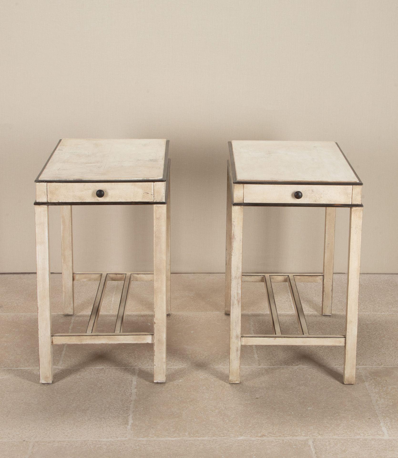 Unusual pair of early 20th Century European painted side or console tables. 
Ebony stringing to the base and beaded in ebonised mahogany. With a drawer to each end.
Very much in the Austrian Secessionist style. Circa 1920.