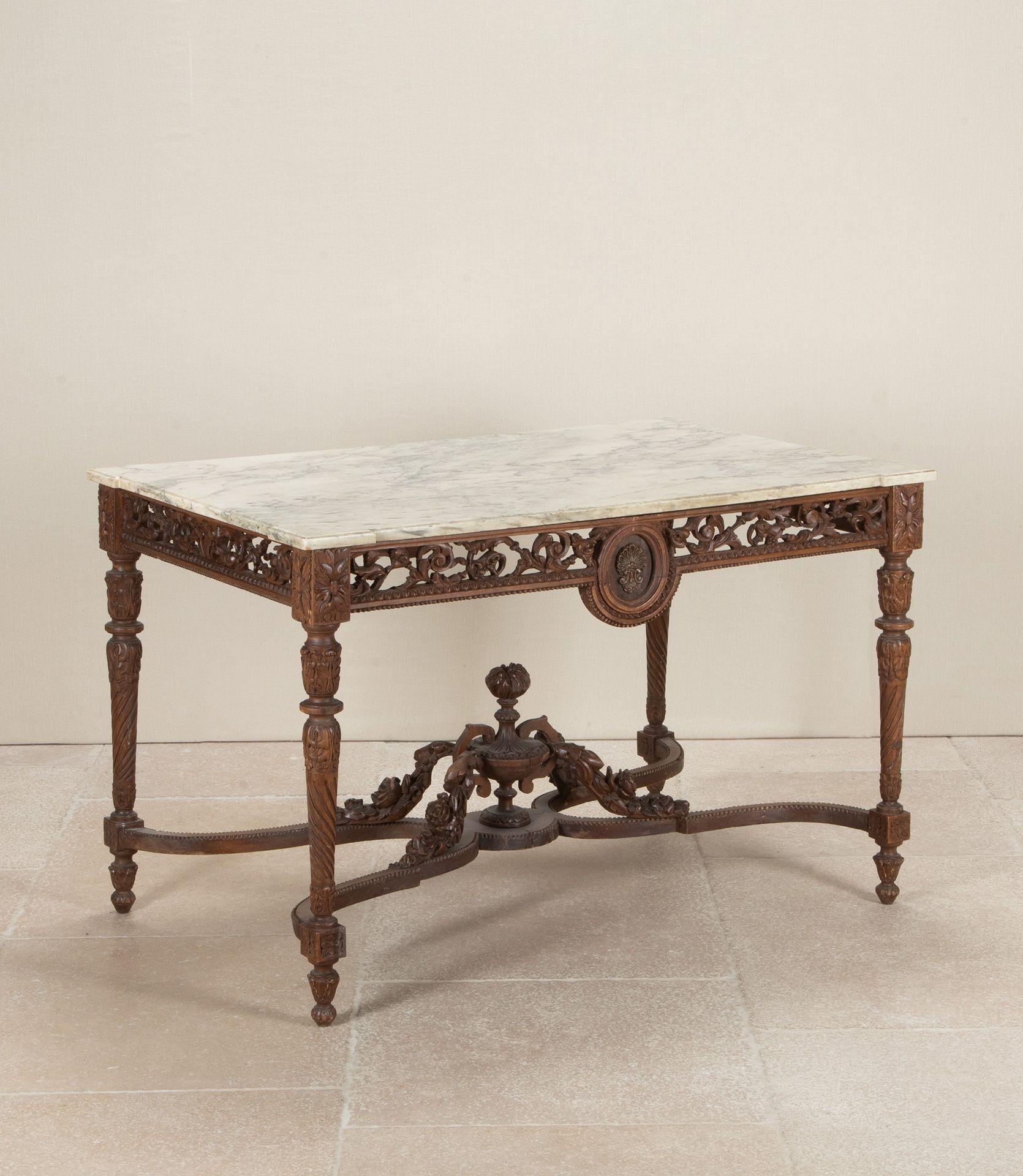 A 19th Century French carved oak console or centre table with it's original marble top.
Displaying beautiful hand carved details to the fretwork and stretchers.