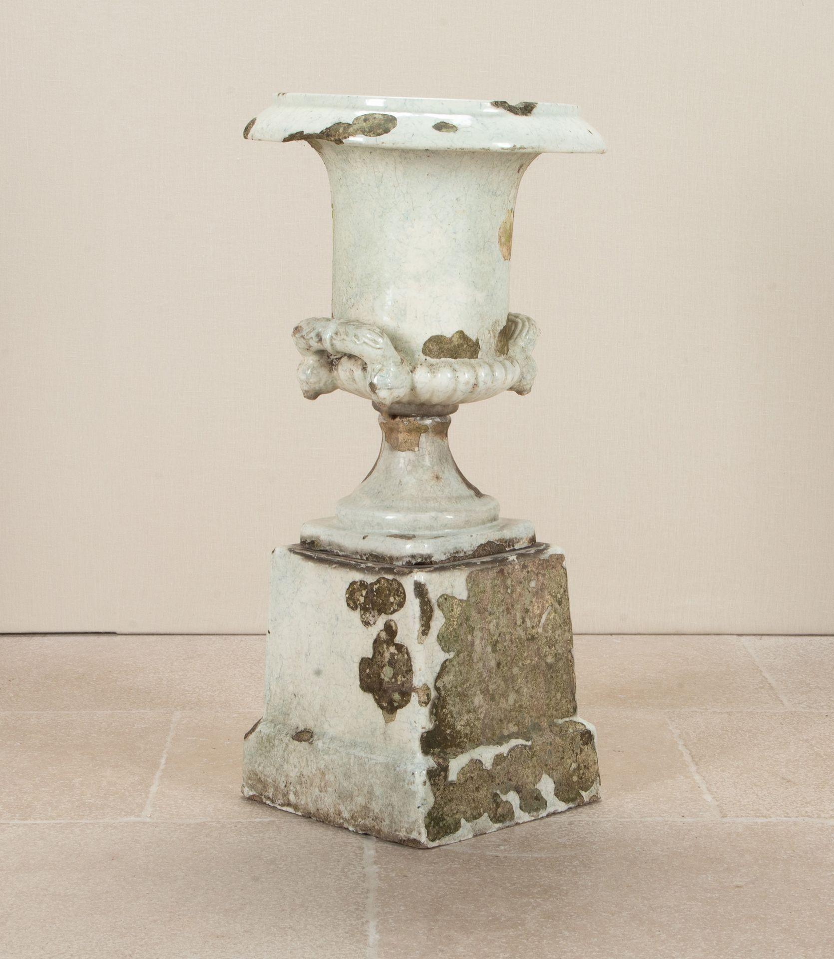 A fine rare late 19th Century English Country House terracotta centrepiece garden urn on pedestal. 
In the style of by Doulton of Lambeth. Of campana form, glazed, rope detail and craquelure detail, above bold masked handles. The urn standing on its