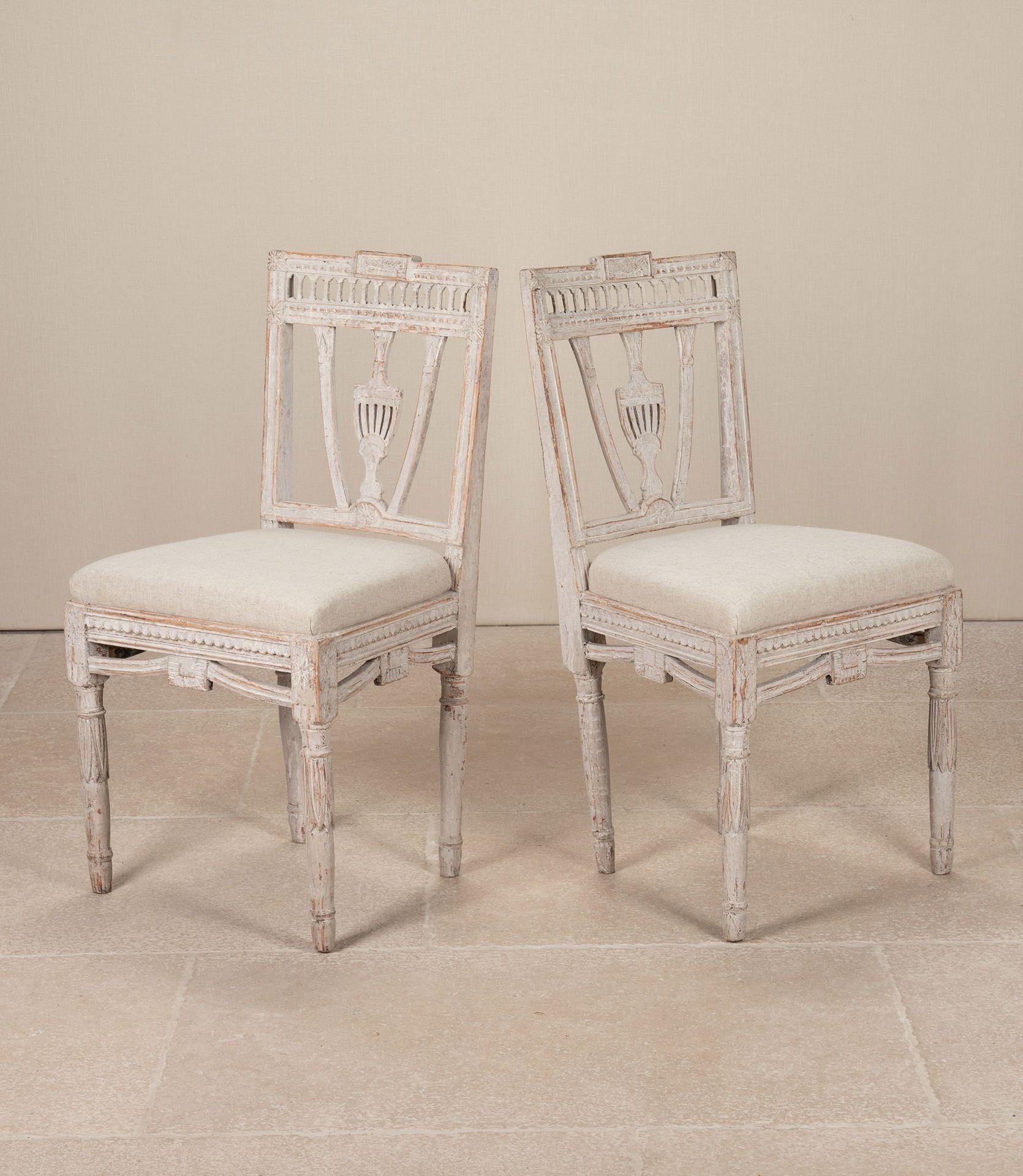 A rare and elegant set of ten 19th Century Gustavian dining chairs crafted in the renowned furniture-making province of Lindome, Sweden. Circa 1820. 
These chairs exemplify the refined neoclassical style characteristic of the Gustavian period, with