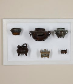 Collection de douze encensoirs chinois en bronze datant de différentes époques, du XVIIIe au XXe siècle