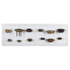 Collection de douze encensoirs chinois en bronze datant de différentes époques, du XVIIIe au XXe siècle