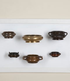 Collection de douze encensoirs chinois en bronze datant de différentes époques, du XVIIIe au XXe siècle