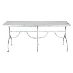 Mesa de bistró francesa de finales del siglo XIX, con estructura de hierro forjado y tablero de granito