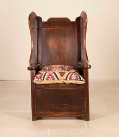 George III Joined Oak and Elm Wing-Back Lambing Chair