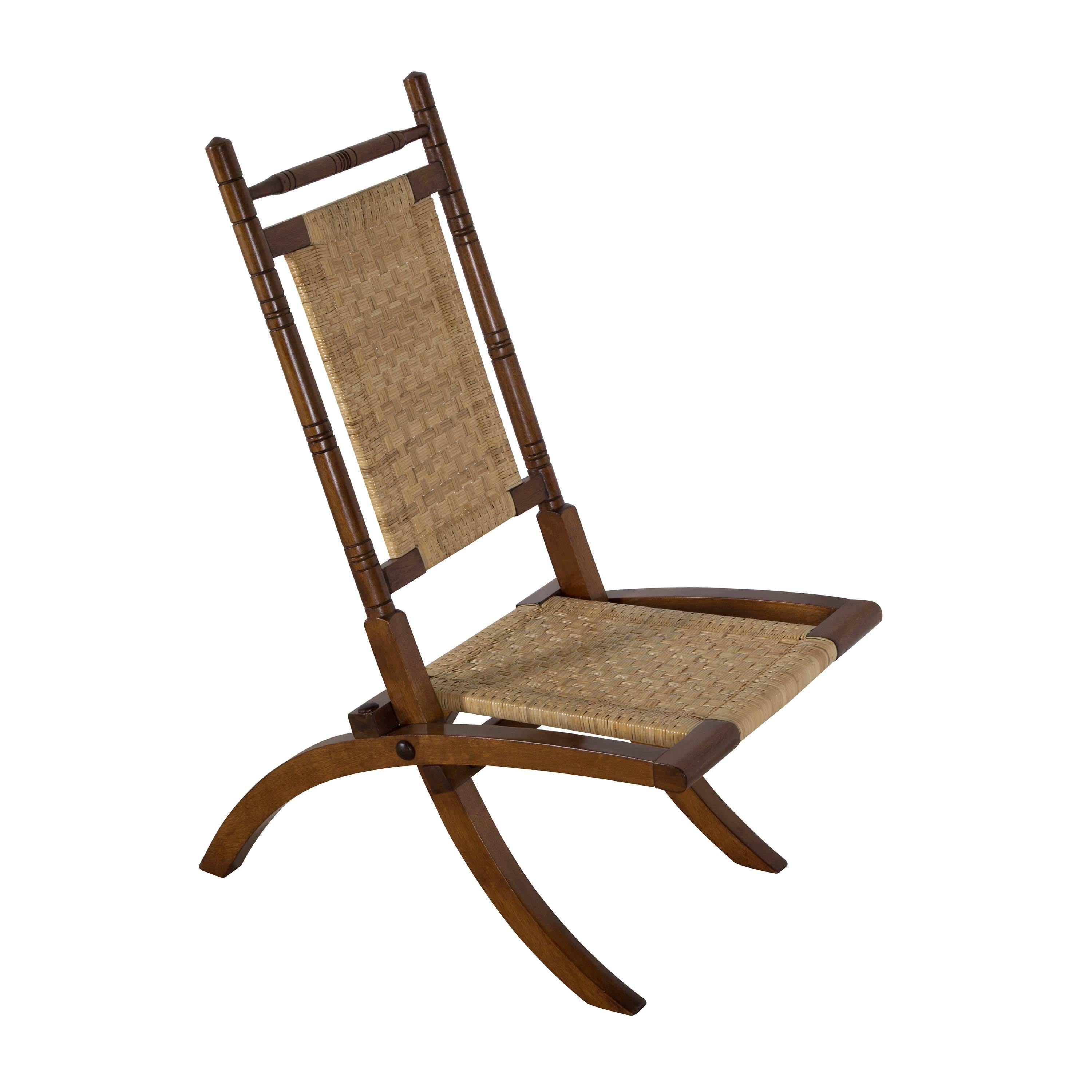 E. W. Godwin folding walnut chair with woven cane back and seat, circa 1880. Good condition. Measures: Seat height 32cm., seat depth 32cm.