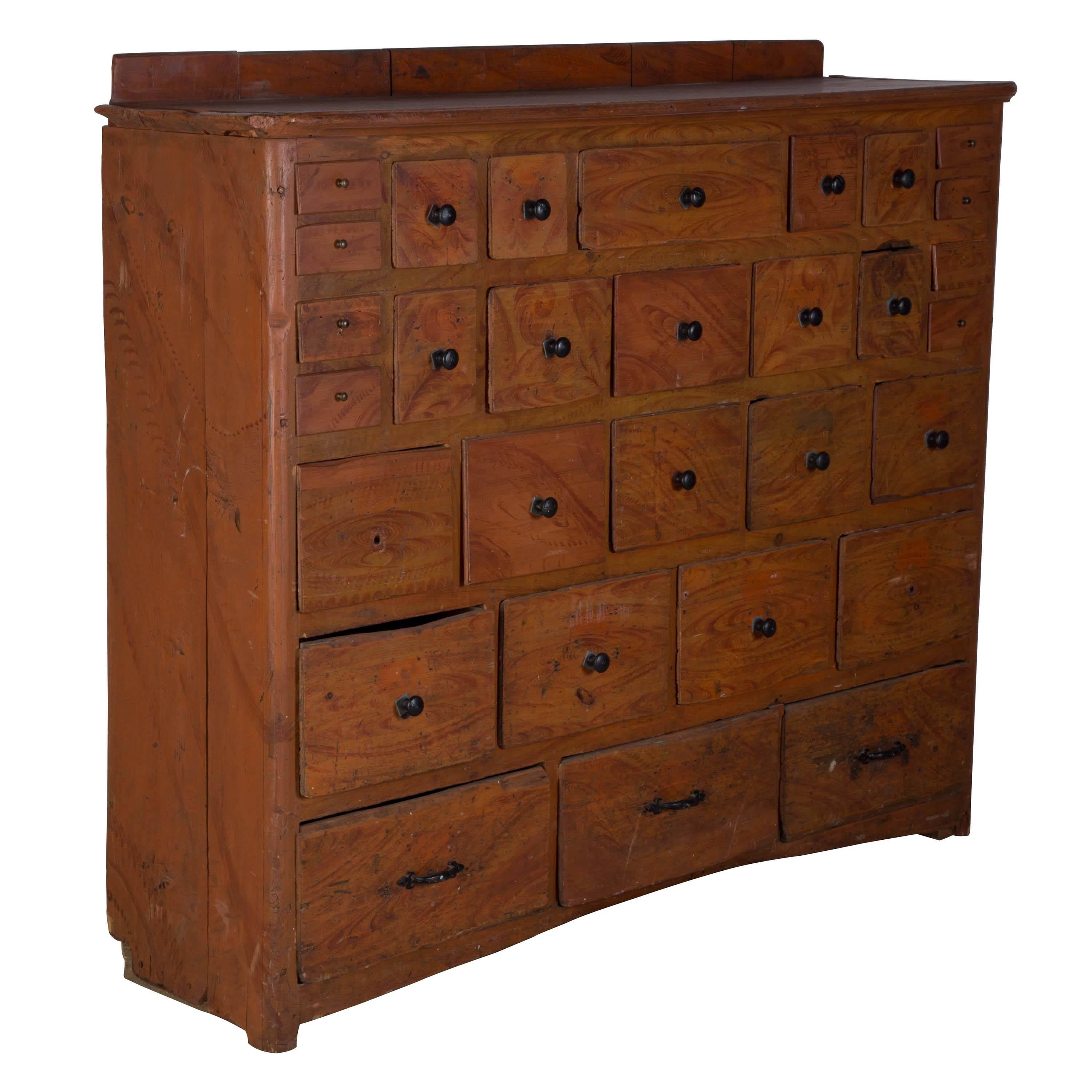 Primitive 19th century bank of drawers in original paint from North Sweden, circa 1850.