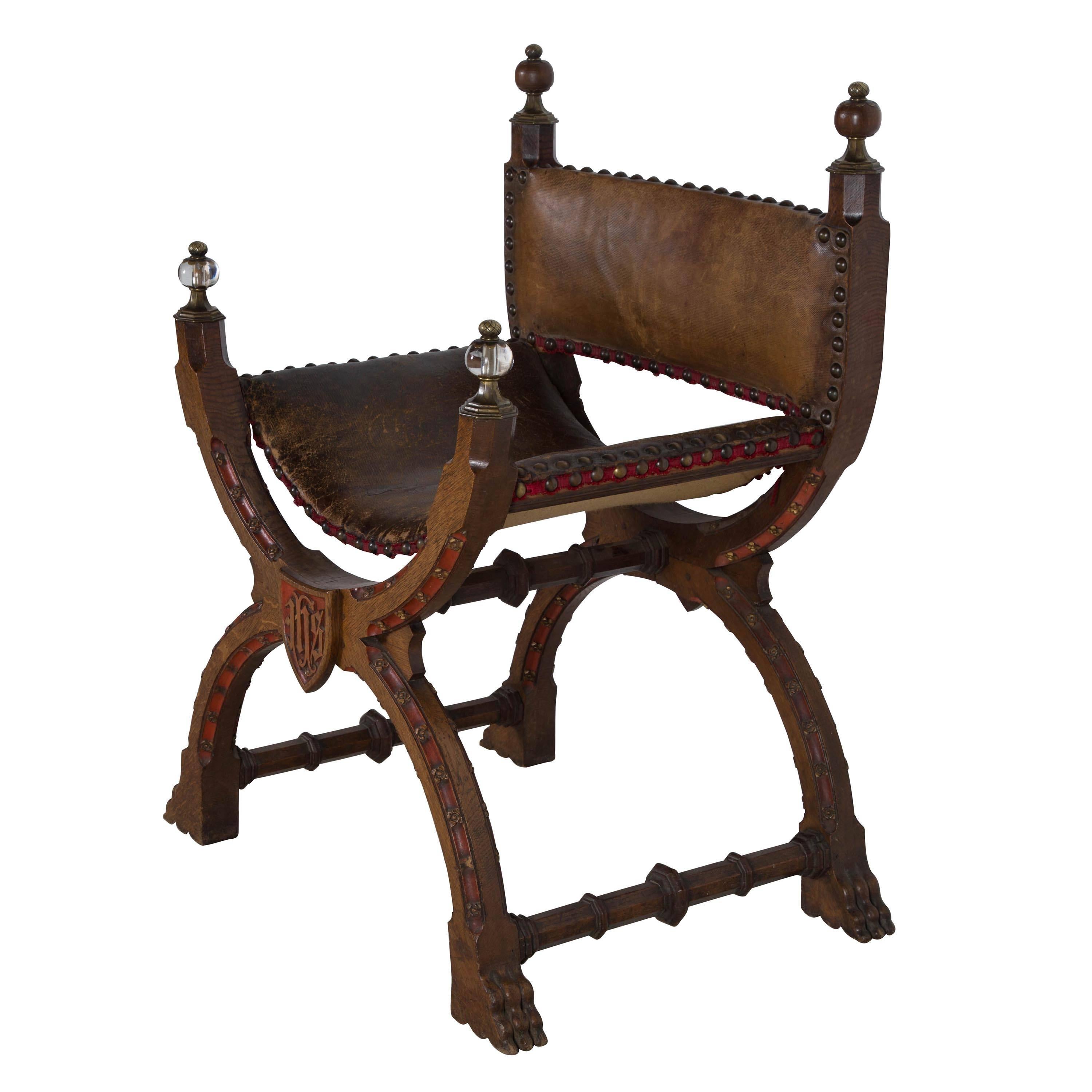 Large 19th century Gothic Revival oak throne chair with old leather seat and backrest. Great design and construction.