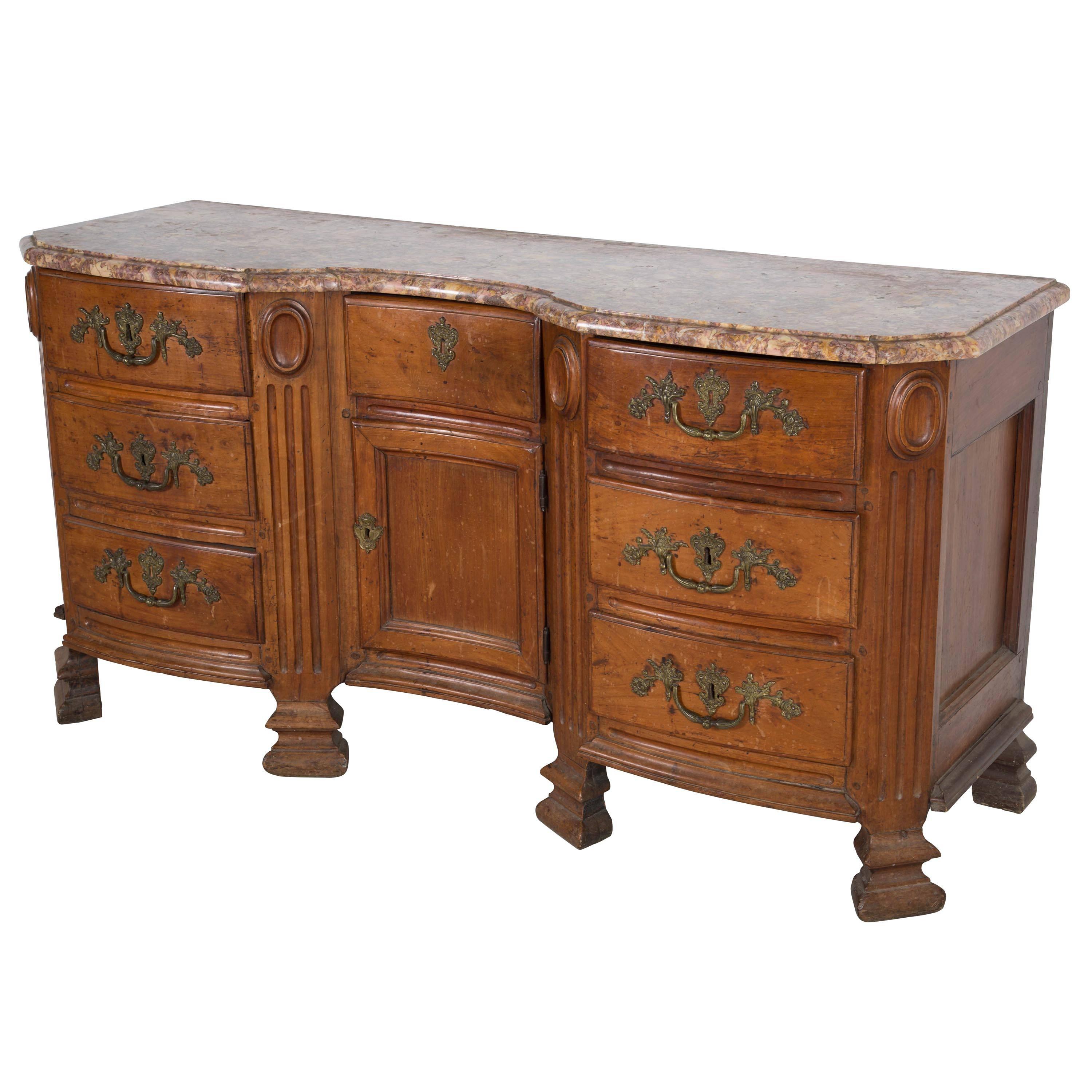 A late 19th century cheery wood and marble topped commode.