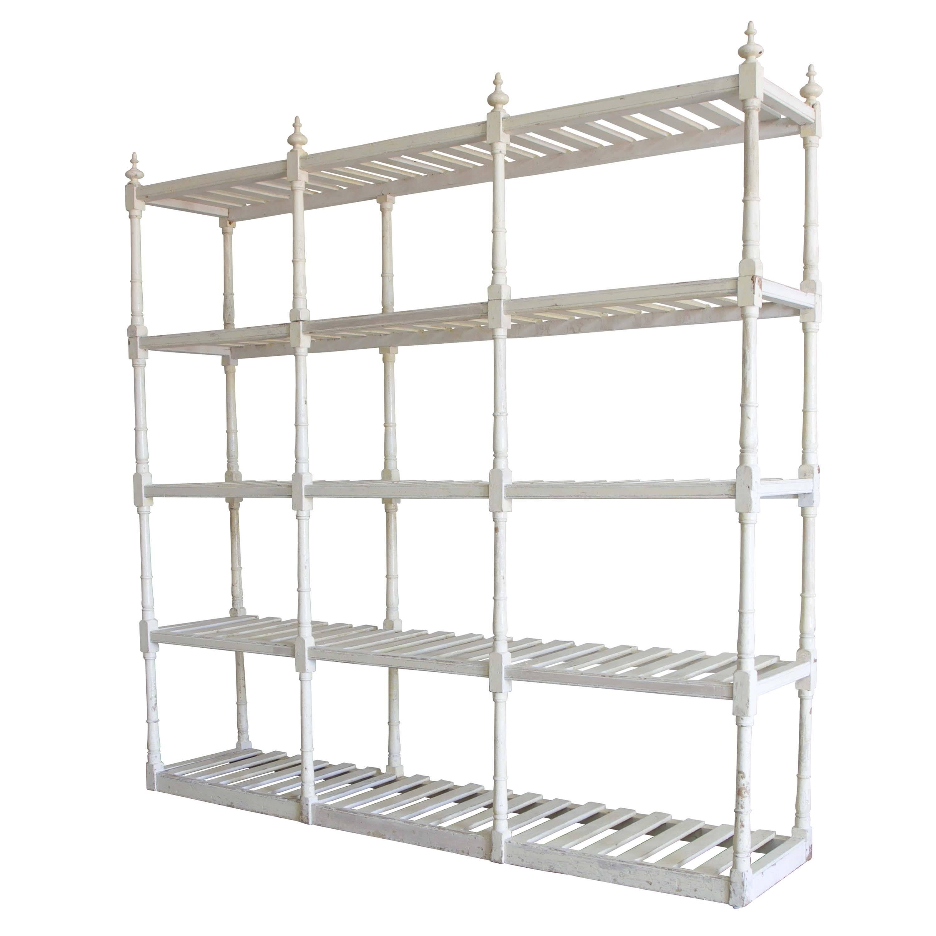 A large English country house linen rack retaining its historic painted finish. England, circa 1850. Top shelf can be removed for ease of transport. Price in exclusive of VAT.