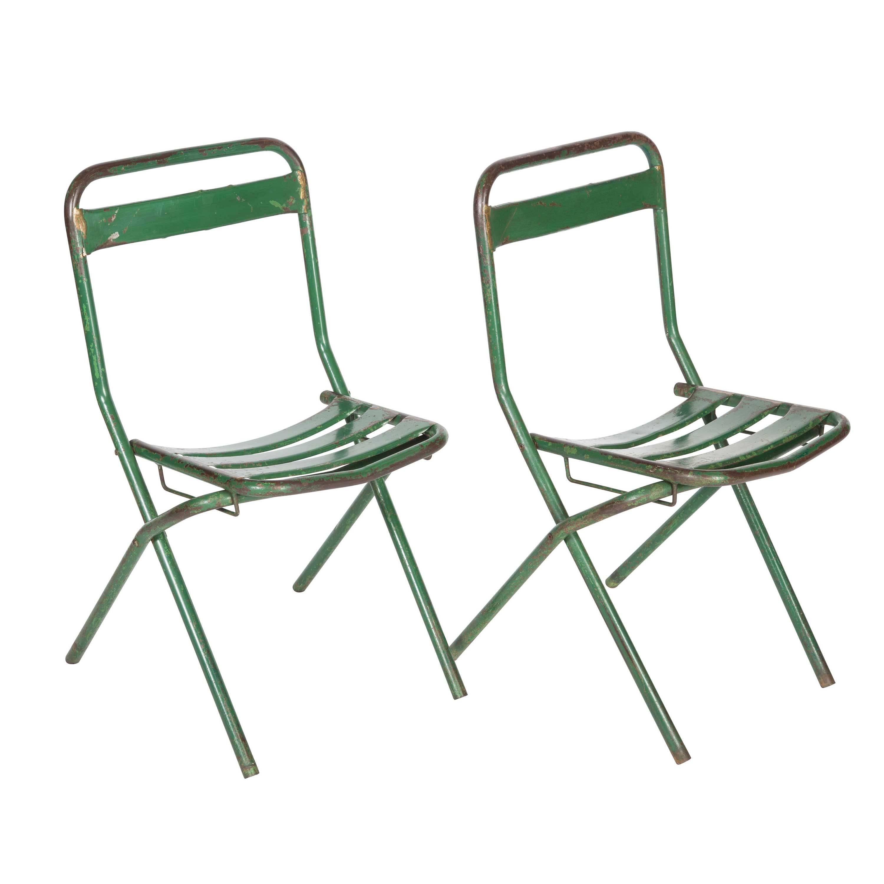 A set of 12 French Industrial steel folding dining chairs, circa 1950 (another twenty four available).